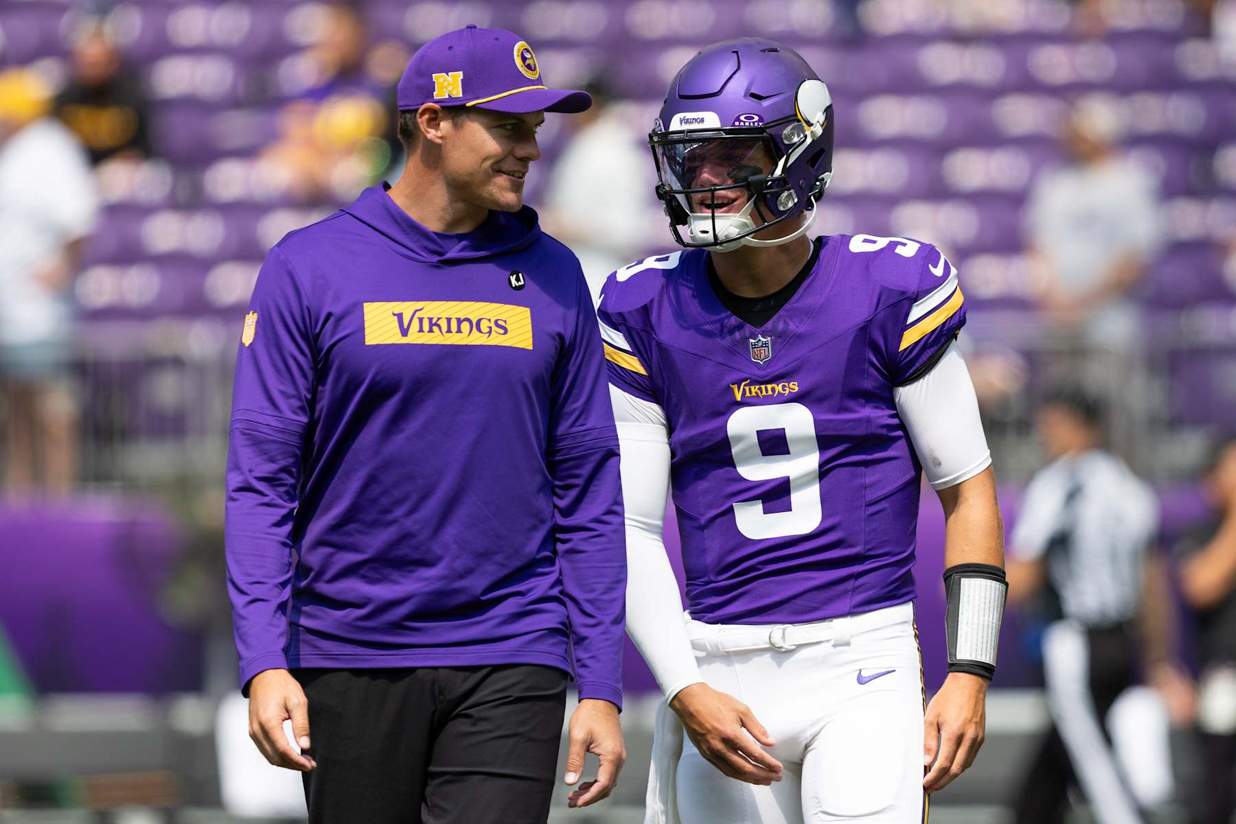 MINNEAPOLIS, MN - AUGUST 10: Minnesota Vikings quarterback J.J. McCarthy (9) talks with head coach Kevin O'Connell before the NFL preseason game between the Las Vegas Raiders and the Minnesota Vikings on August 10, 2024, at U.S. Bank Stadium in Minneapolis, MN. (Photo by Bailey Hillesheim/Icon Sportswire via Getty Images)