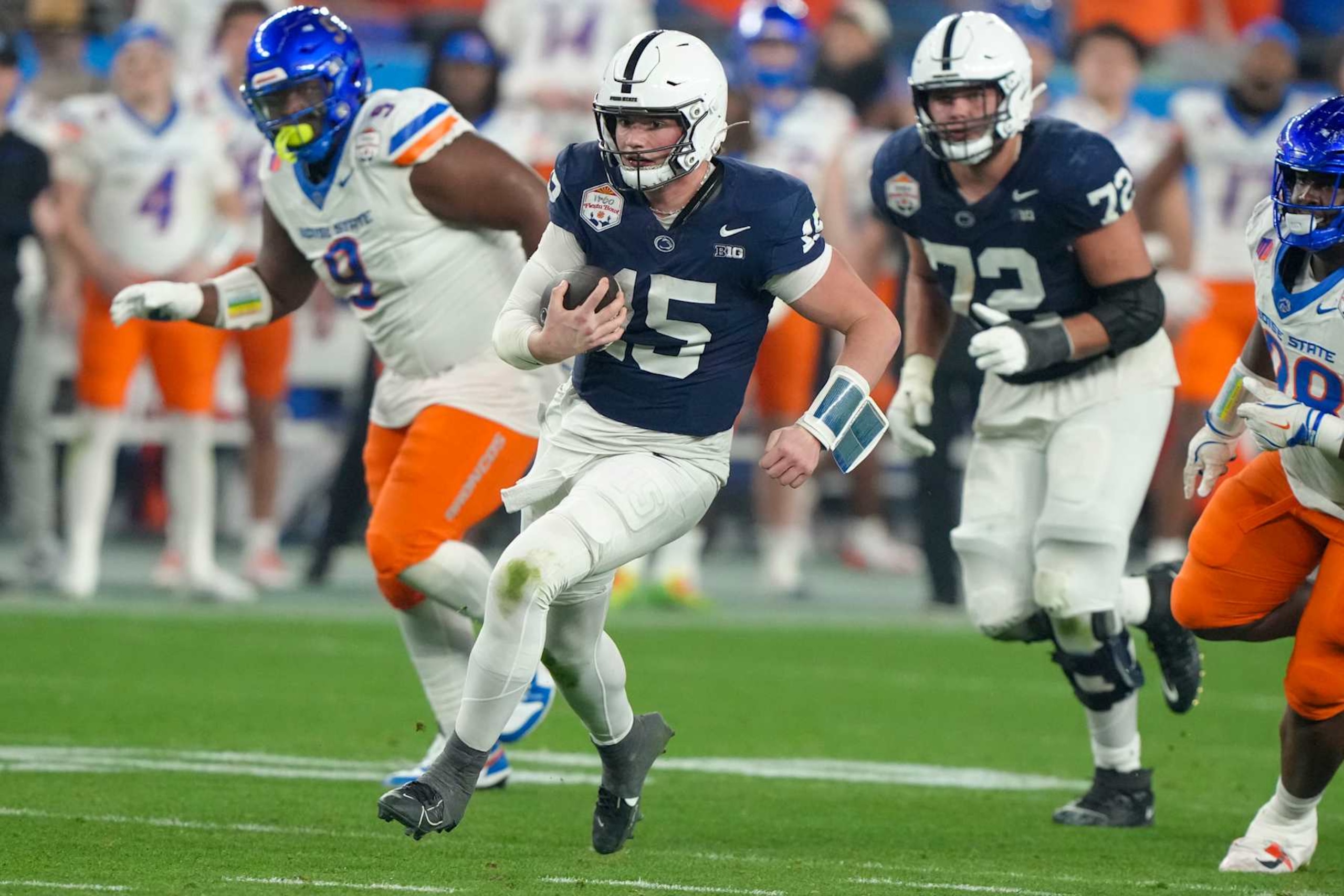 GLENDALE, ARIZONA - DECEMBER 31: Drew Allar #15 of the Penn State Nittany Lions scrambles during the second half of the Fiesta Bowl game against the Boise State Broncos at State Farm Stadium on December 31, 2024 in Glendale, Arizona. (Photo by CFP/Getty Images)