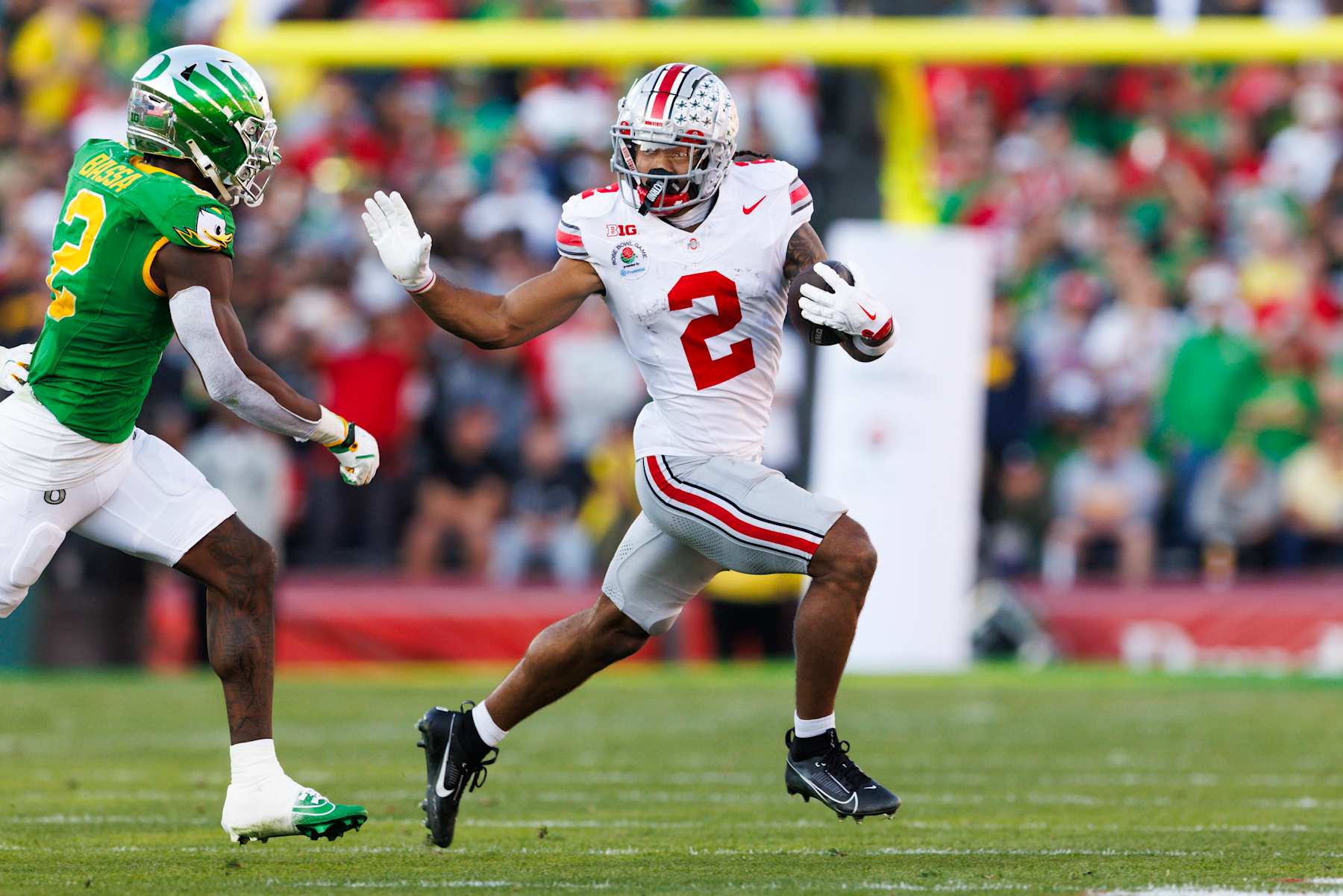 PASADENA, CALIFORNIA - JANUARY 1: Emeka Egbuka #2 of the Ohio State Buckeyes runs after the catch in the first half during the Rose Bowl against Oregon Ducks at Rose Bowl Stadium on January 1, 2025 in Pasadena, California. (Photo by Ric Tapia/Getty Images)