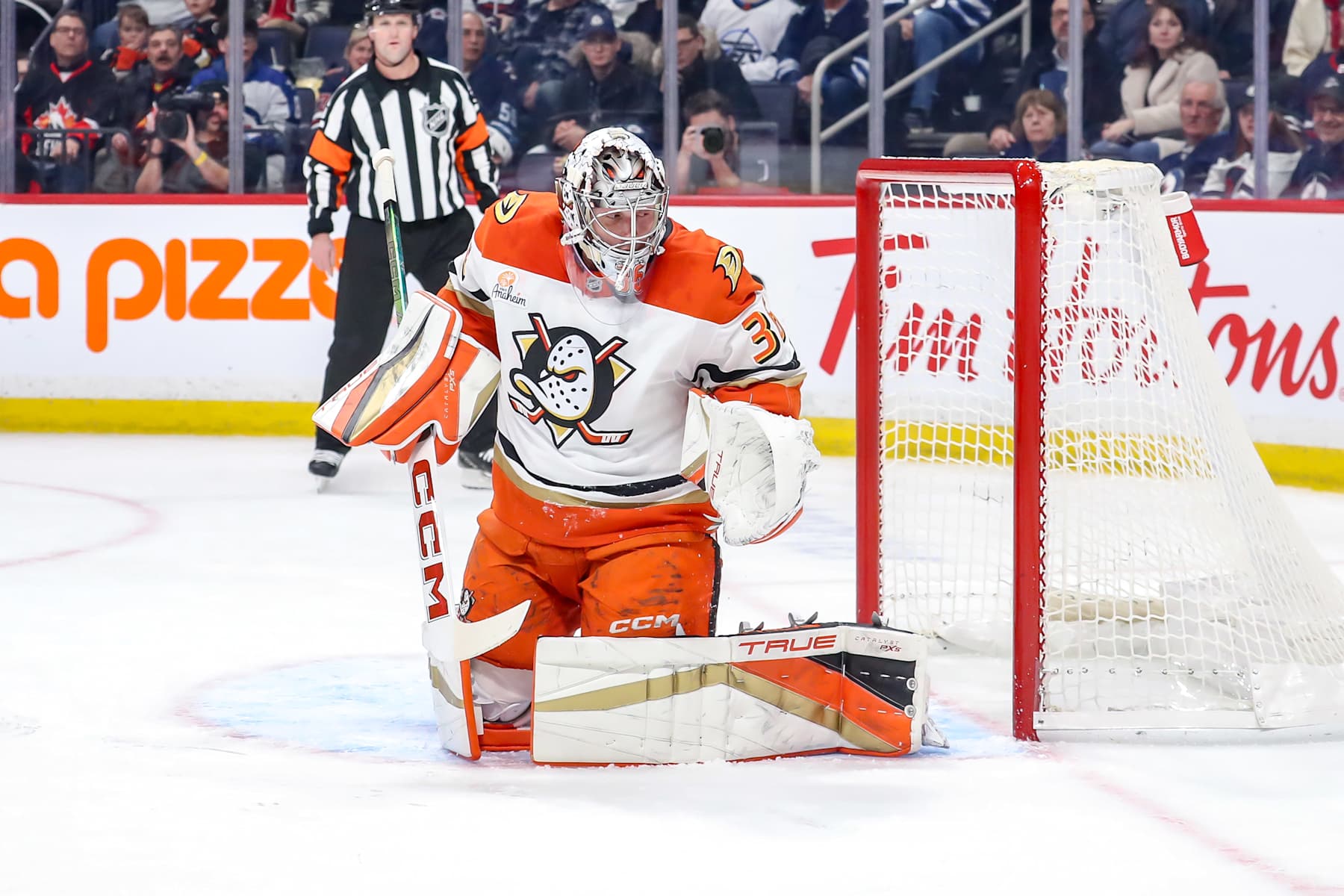 WINNIPEG, CANADA - JANUARY 2: Goaltender John Gibson #36 of the Anaheim Ducks guards the net during first period action against the Winnipeg Jets at the Canada Life Centre on January 2, 2025 in Winnipeg, Manitoba, Canada. The Ducks defeated the Jets 4-3 in overtime. (Photo by Darcy Finley/NHLI via Getty Images)