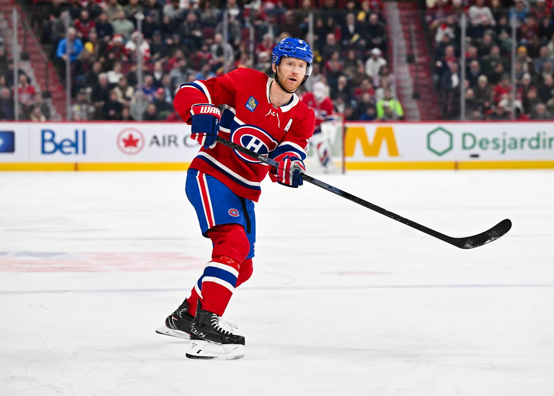 MONTREAL, CANADA - DECEMBER 21:  Mike Matheson #8 of the Montreal Canadiens skates during the second period against the Detroit Red Wings at the Bell Centre on December 21, 2024 in Montreal, Quebec, Canada.  The Montreal Canadiens defeated the Detroit Red Wings 5-1.  (Photo by Minas Panagiotakis/Getty Images)