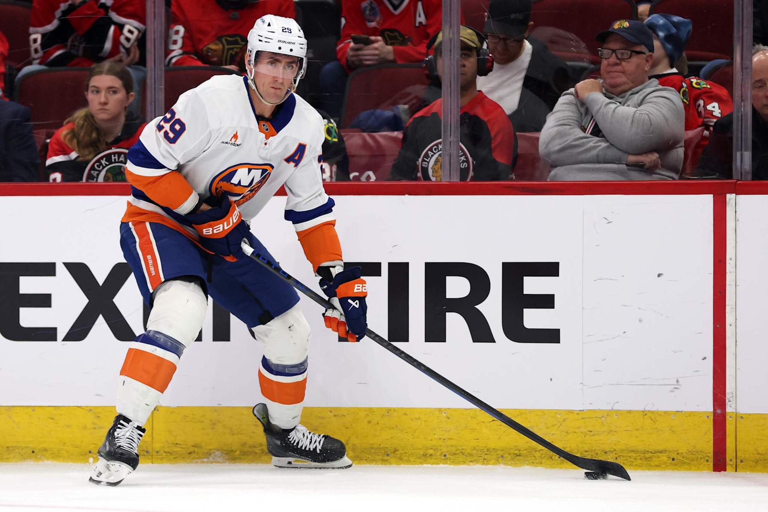 CHICAGO, ILLINOIS - DECEMBER 15: Brock Nelson #29 of the New York Islanders controls the puck during the first period against the Chicago Blackhawks at the United Center on December 15, 2024 in Chicago, Illinois. (Photo by Stacy Revere/Getty Images)