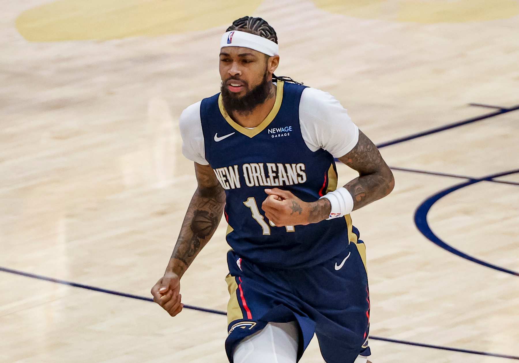 NEW ORLEANS, LOUISIANA - DECEMBER 5:  Brandon Ingram #14 of the New Orleans Pelicans plays against the Phoenix Suns during the first half of a game at the Smoothie King Center on December 5, 2024 in New Orleans, Louisiana. NOTE TO USER: User expressly acknowledges and agrees that, by downloading and or using this photograph, User is consenting to the terms and conditions of the Getty Images License Agreement. (Photo by Derick E. Hingle/Getty Images)