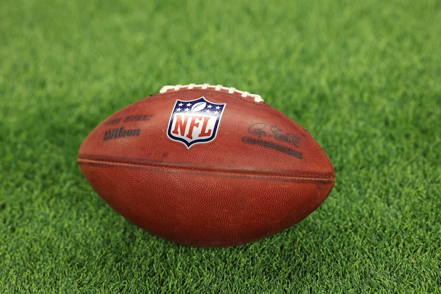 INDIANAPOLIS, INDIANA - DECEMBER 22: A detailed view of an NFL logo is seen on a football as the Tennessee Titans take on the Indianapolis Colts at Lucas Oil Stadium on December 22, 2024 in Indianapolis, Indiana. (Photo by Andy Lyons/Getty Images)