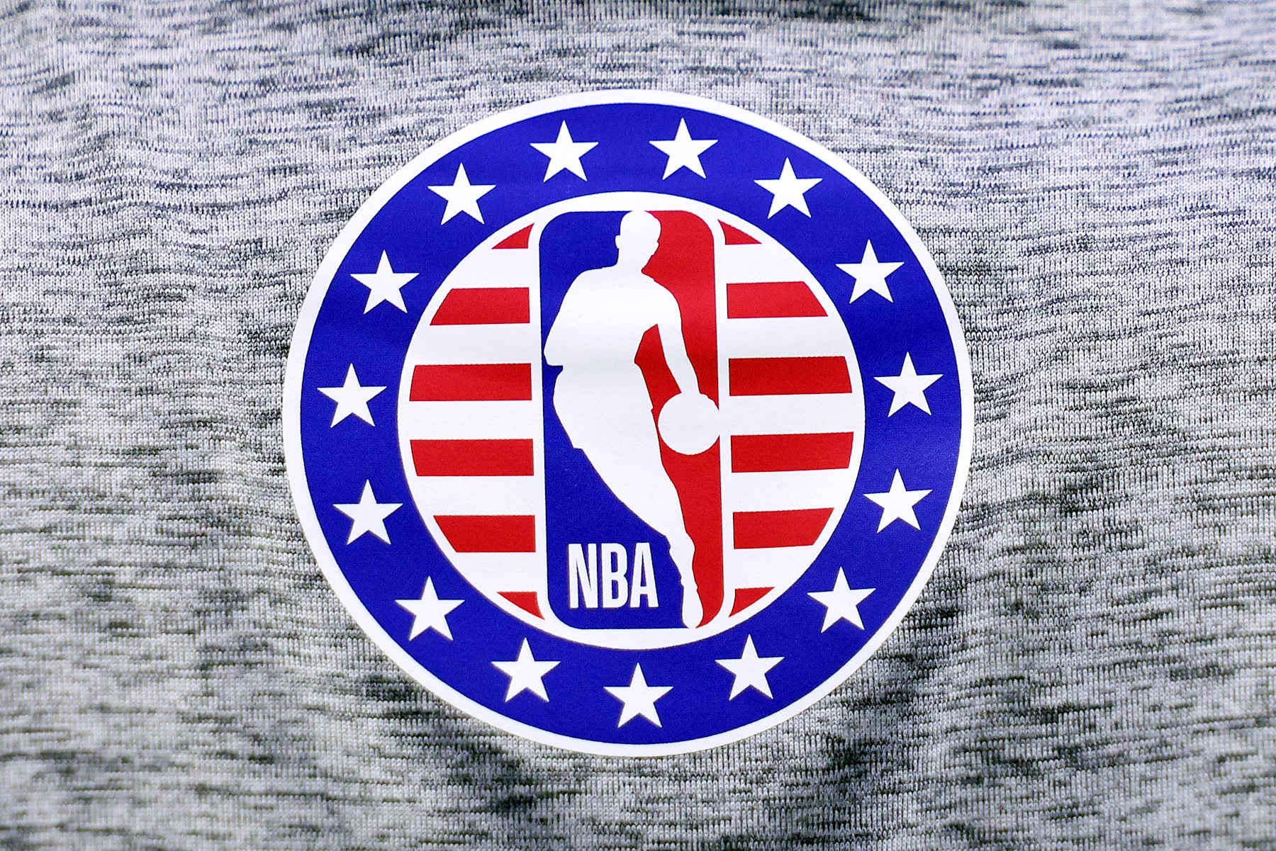 MINNEAPOLIS, MINNESOTA - NOVEMBER 10: A detailed view of the NBA logo for Veterans Day prior to the start of the game between the Miami Heat and Minnesota Timberwolves at Target Center on November 10, 2024 in Minneapolis, Minnesota. The Heat defeated the Timberwolves 95-94. NOTE TO USER: User expressly acknowledges and agrees that, by downloading and or using this photograph, User is consenting to the terms and conditions of the Getty Images License Agreement. (Photo by David Berding/Getty Images)