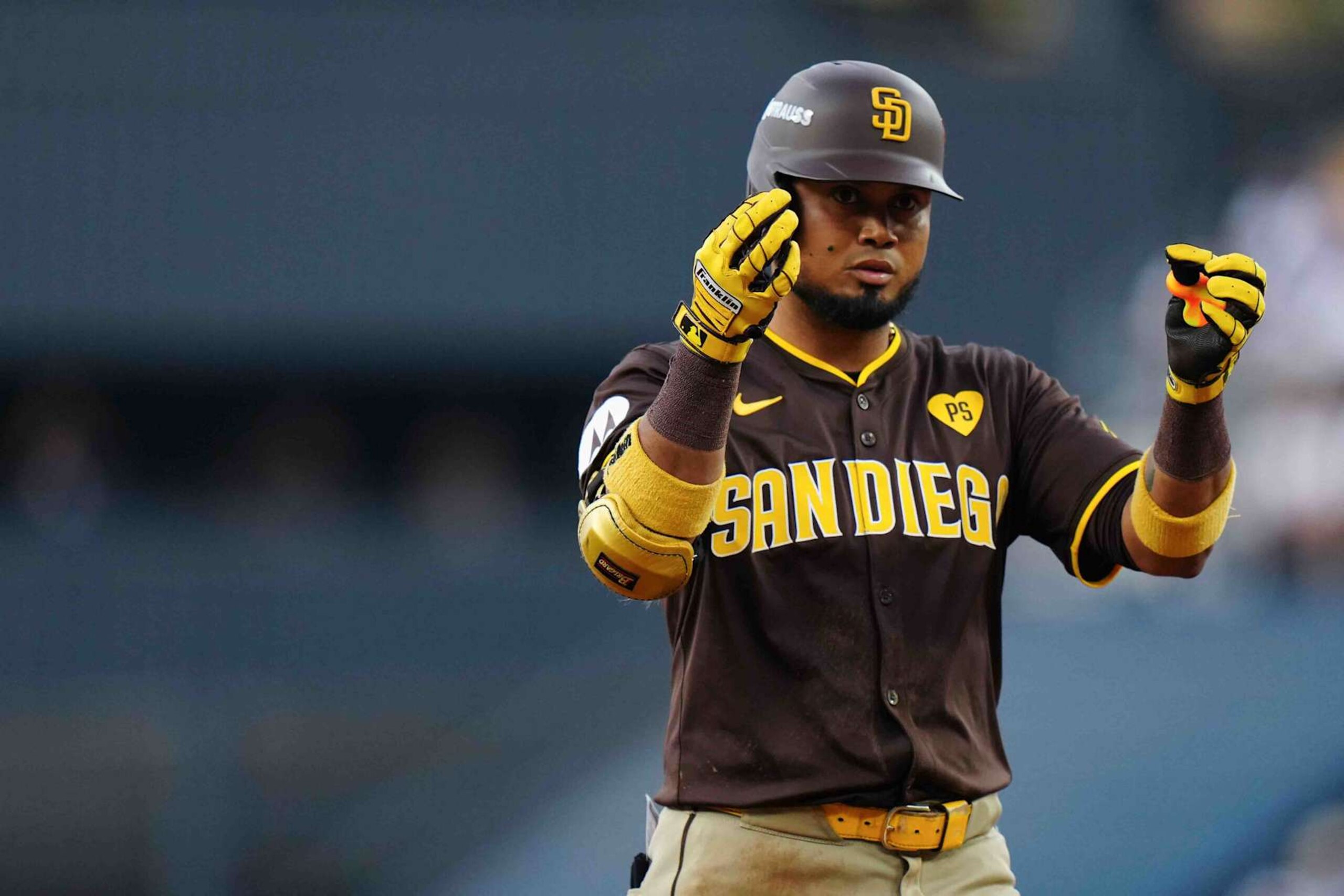 LOS ANGELES, CA - OCTOBER 11: Luis Arraez #4 of the San Diego Padres reacts after hitting a single in the third inning during Game 5 of the Division Series presented by Booking.com between the San Diego Padres and the Los Angeles Dodgers at Dodger Stadium on Friday, October 11, 2024 in Los Angeles, California. (Photo by Daniel Shirey/MLB Photos via Getty Images) LOS ANGELES, CA - OCTOBER 11: Luis Arraez #4 of the San Diego Padres reacts after hitting a single in the third inning during Game 5 of the Division Series presented by Booking.com between the San Diego Padres and the Los Angeles Dodgers at Dodger Stadium on Friday, October 11, 2024 in Los Angeles, California. (Photo by Daniel Shirey/MLB Photos via Getty Images)