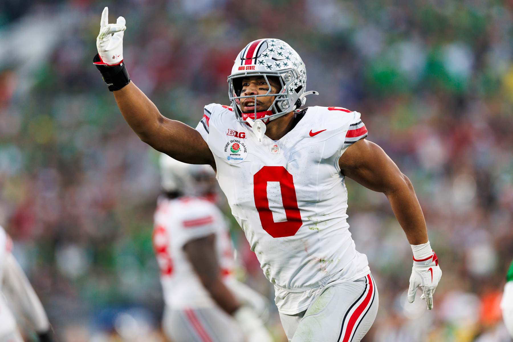 PASADENA, CALIFORNIA - JANUARY 1: Cody Simon #0 of the Ohio State Buckeyes celebrates in the second half during the Rose Bowl against Oregon Ducks at Rose Bowl Stadium on January 1, 2025 in Pasadena, California. (Photo by Ric Tapia/Getty Images)