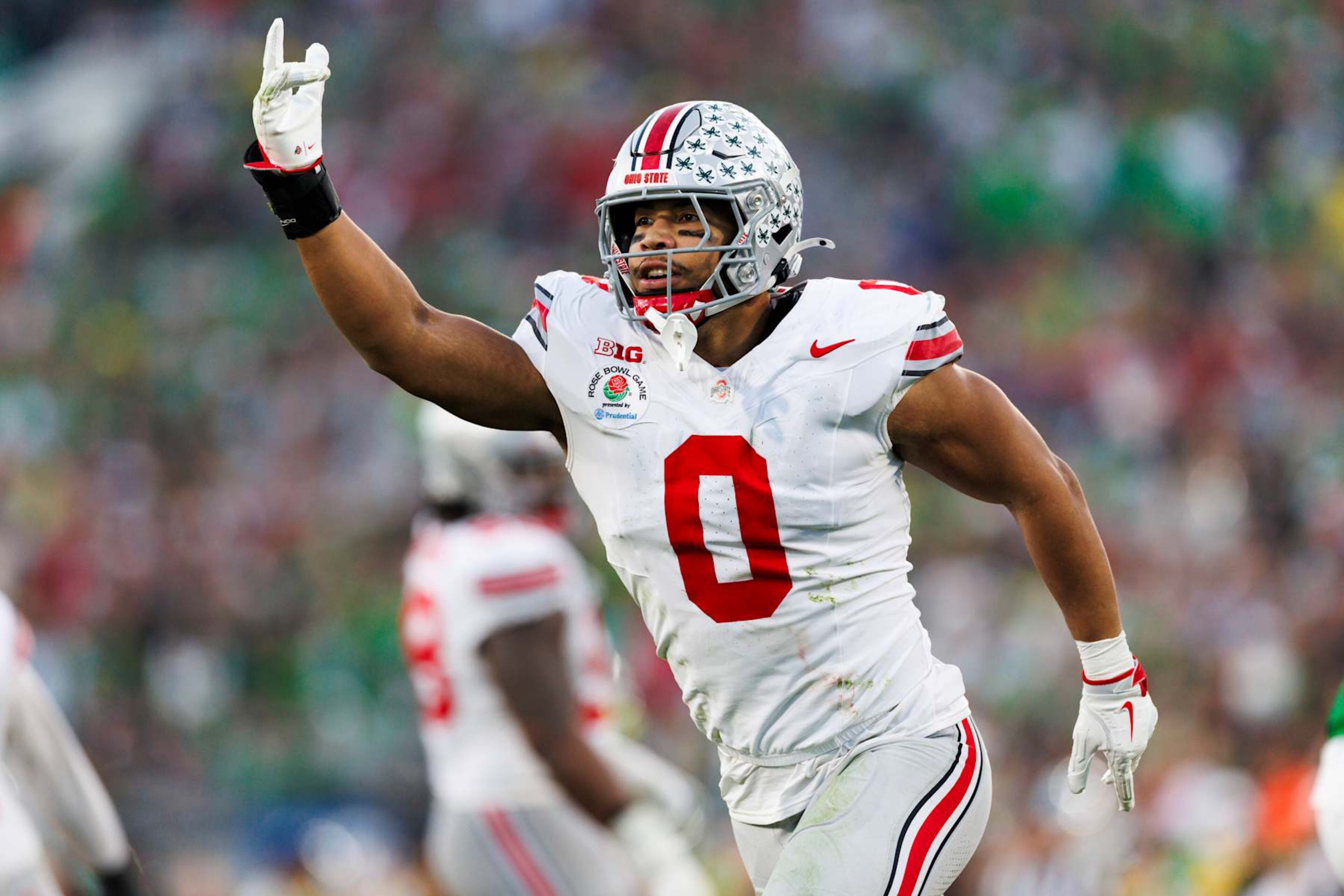 PASADENA, CALIFORNIA - JANUARY 1: Cody Simon #0 of the Ohio State Buckeyes celebrates in the second half during the Rose Bowl against Oregon Ducks at Rose Bowl Stadium on January 1, 2025 in Pasadena, California. (Photo by Ric Tapia/Getty Images) PASADENA, CALIFORNIA - JANUARY 1: Cody Simon #0 of the Ohio State Buckeyes celebrates in the second half during the Rose Bowl against Oregon Ducks at Rose Bowl Stadium on January 1, 2025 in Pasadena, California. (Photo by Ric Tapia/Getty Images)