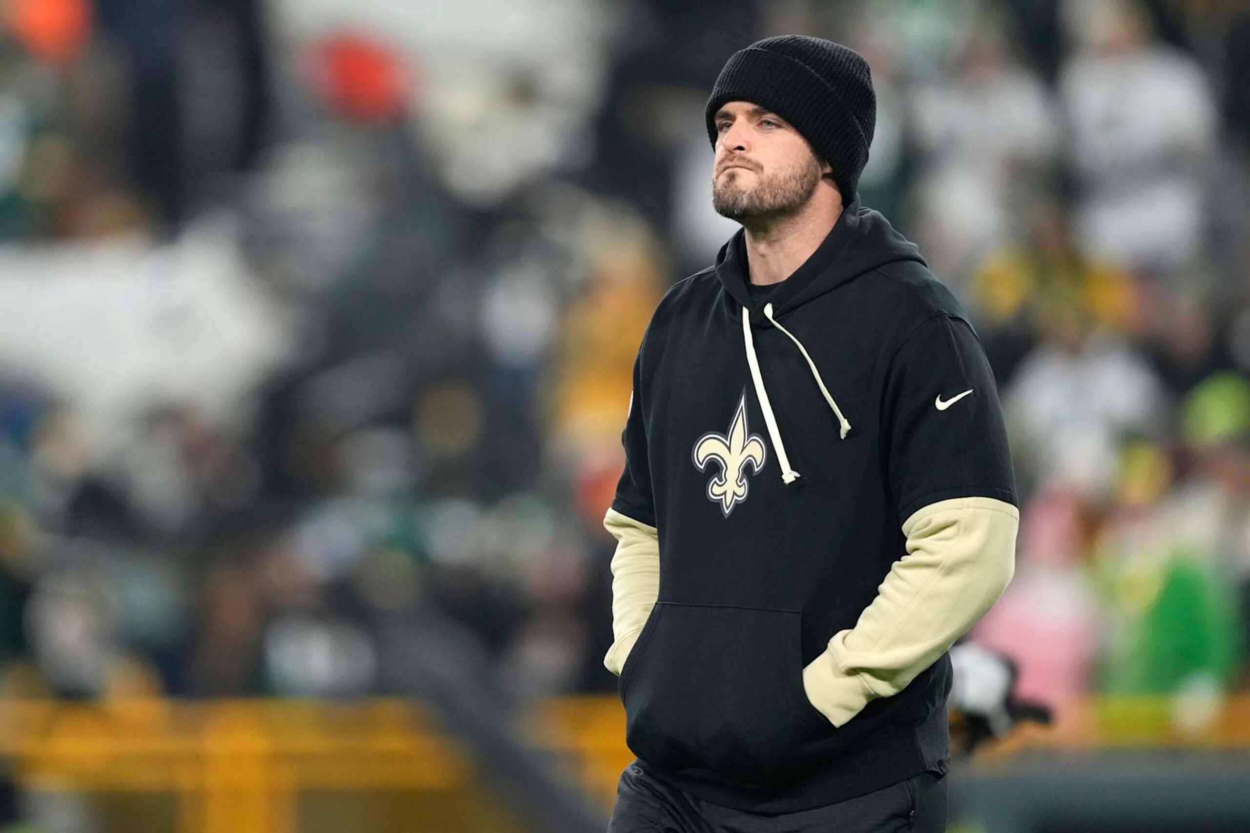 GREEN BAY, WISCONSIN - DECEMBER 23: Derek Carr #4 of the New Orleans Saints looks on before the game against the Green Bay Packers at Lambeau Field on December 23, 2024 in Green Bay, Wisconsin. (Photo by Patrick McDermott/Getty Images) GREEN BAY, WISCONSIN - DECEMBER 23: Derek Carr #4 of the New Orleans Saints looks on before the game against the Green Bay Packers at Lambeau Field on December 23, 2024 in Green Bay, Wisconsin. (Photo by Patrick McDermott/Getty Images)
