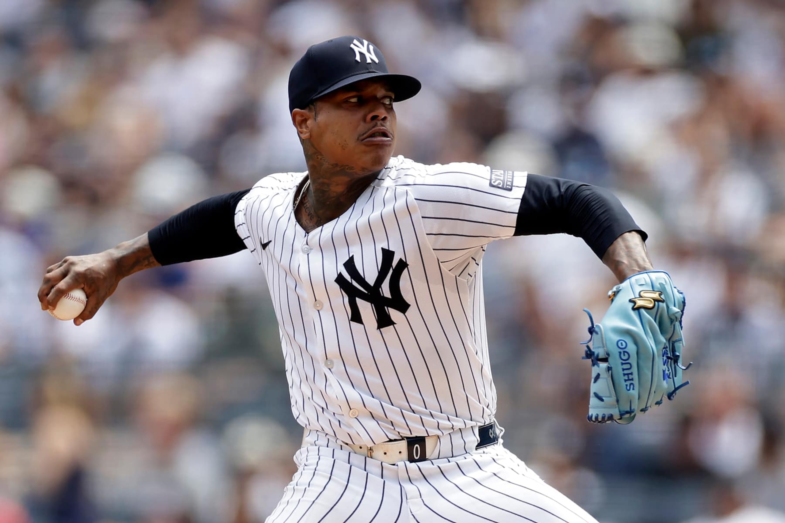 NEW YORK, NY - AUGUST 11: Marcus Stroman #0 of the New York Yankees pitches during the first inning against the Texas Rangers at Yankee Stadium on August 11, 2024 in New York City. (Photo by Adam Hunger/Getty Images)