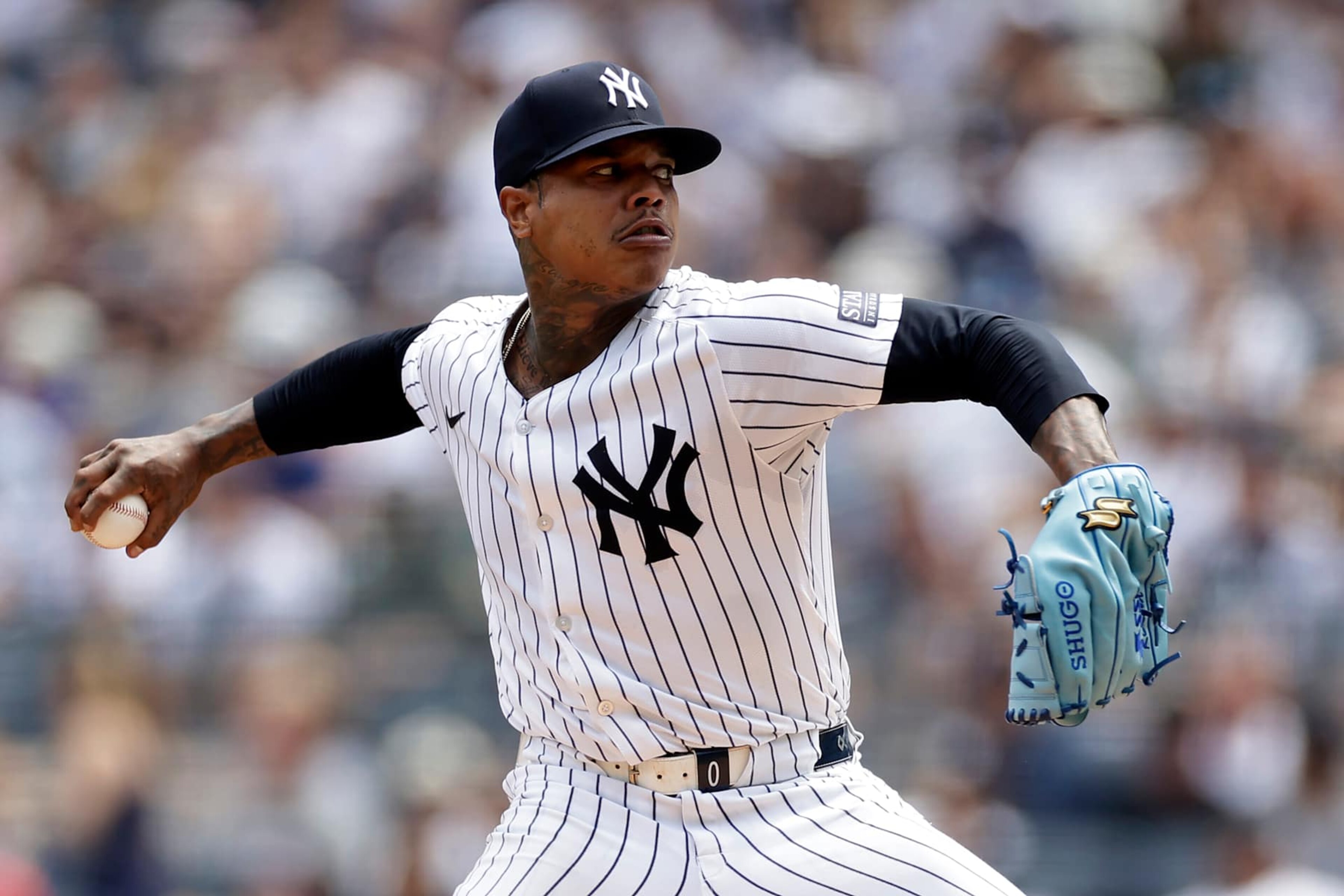 NEW YORK, NY - AUGUST 11: Marcus Stroman #0 of the New York Yankees pitches during the first inning against the Texas Rangers at Yankee Stadium on August 11, 2024 in New York City. (Photo by Adam Hunger/Getty Images)