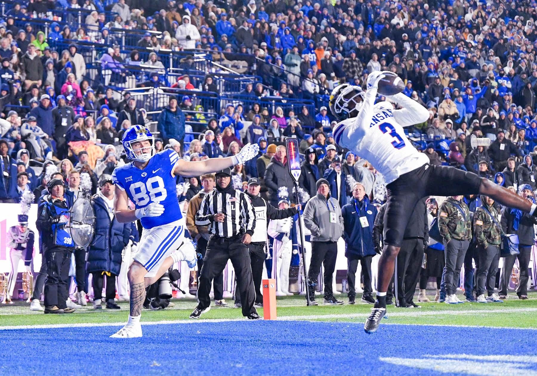 PROVO, UT - NOVEMBER 16: Kansas Jayhawks wide receiver Keaton Kubecka (3) makes a huge interception in the end zone before halftime during a game between the Kanas Jayhawks and the BYU Cougars during a college football game on November 16, 2024 at Lavell Edwards Stadium in Provo, Utah.  (Photo by Boyd Ivey/Icon Sportswire via Getty Images)
