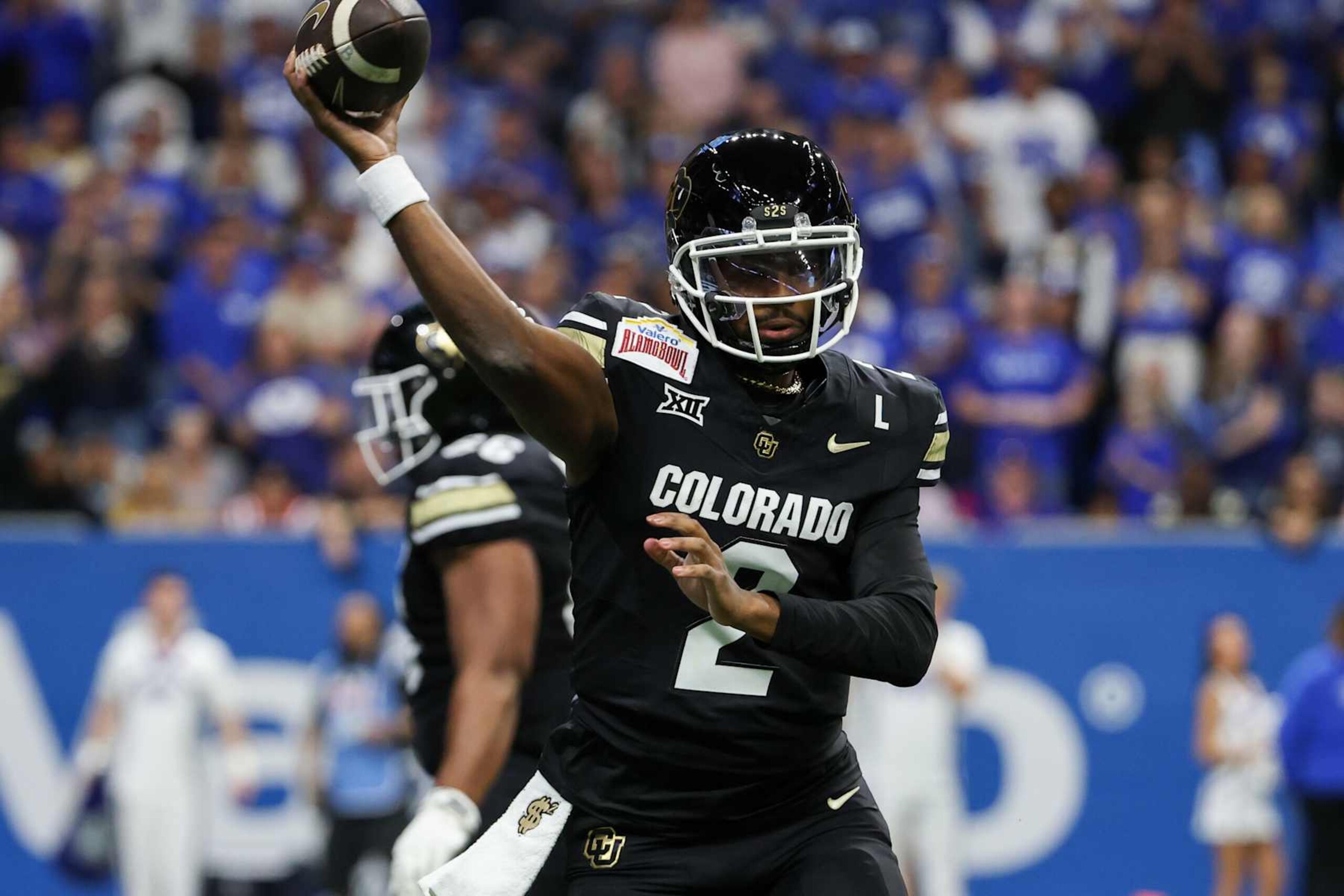 SAN ANTONIO, TX - DECEMBER 28: Colorado Buffaloes quarterback Shedeur Sanders (2) passes the ball during the football game between BYU Cougars and Colorado Buffalos on December 28, 2024, at the Alamodome in San Antonio, Texas. (Photo by David Buono/Icon Sportswire via Getty Images) SAN ANTONIO, TX - DECEMBER 28: Colorado Buffaloes quarterback Shedeur Sanders (2) passes the ball during the football game between BYU Cougars and Colorado Buffalos on December 28, 2024, at the Alamodome in San Antonio, Texas. (Photo by David Buono/Icon Sportswire via Getty Images)