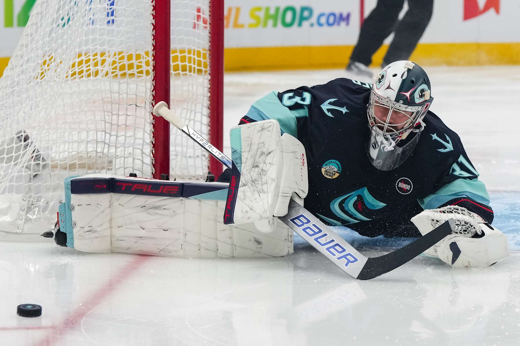 SEATTLE, WASHINGTON - JANUARY 06: Philipp Grubauer #31 of the Seattle Kraken blocks a shot during the first period of a game against the New Jersey Devils at Climate Pledge Arena on January 06, 2025 in Seattle, Washington. (Photo by Liv Lyons/NHLI via Getty Images)