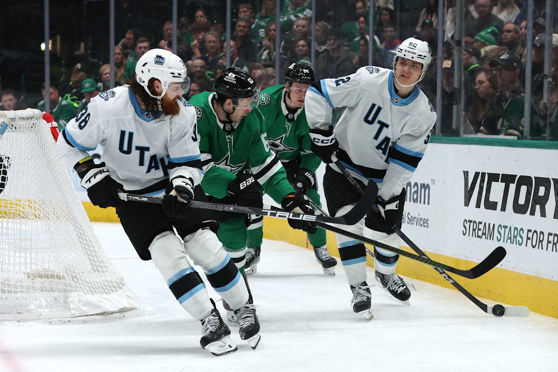 DALLAS, TEXAS - JANUARY 04: Vladislav Kolyachonok #52 of the Utah Hockey Club skates with the puck during the third period against the Dallas Stars at American Airlines Center on January 04, 2025 in Dallas, Texas. (Photo by Sam Hodde/Getty Images)