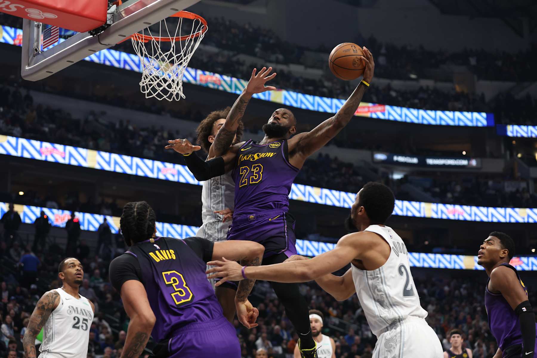 DALLAS, TX - JANUARY 7: LeBron James #23 of the Los Angeles Lakers dunks the ball during the game against the Dallas Mavericks on January 7, 2025 at American Airlines Center in Dallas, Texas. NOTE TO USER: User expressly acknowledges and agrees that, by downloading and or using this photograph, User is consenting to the terms and conditions of the Getty Images License Agreement. Mandatory Copyright Notice: Copyright 2025 NBAE (Photo by Tim Heitman/NBAE via Getty Images)