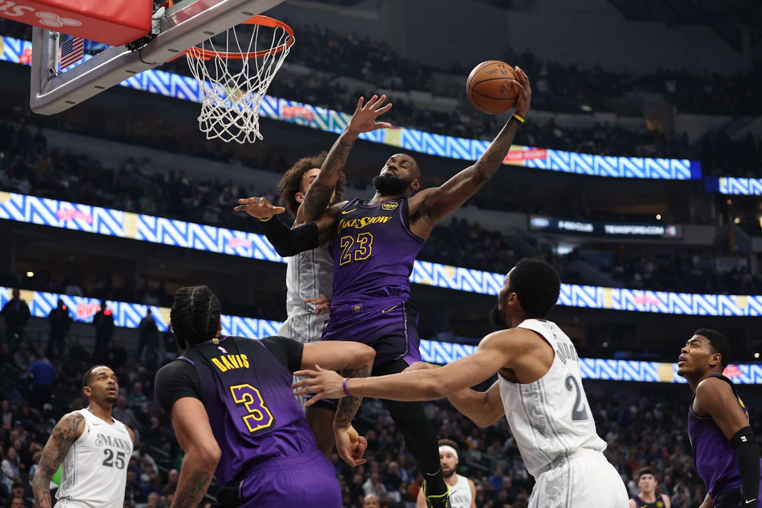 DALLAS, TX - JANUARY 7: LeBron James #23 of the Los Angeles Lakers dunks the ball during the game against the Dallas Mavericks on January 7, 2025 at American Airlines Center in Dallas, Texas. NOTE TO USER: User expressly acknowledges and agrees that, by downloading and or using this photograph, User is consenting to the terms and conditions of the Getty Images License Agreement. Mandatory Copyright Notice: Copyright 2025 NBAE (Photo by Tim Heitman/NBAE via Getty Images) DALLAS, TX - JANUARY 7: LeBron James #23 of the Los Angeles Lakers dunks the ball during the game against the Dallas Mavericks on January 7, 2025 at American Airlines Center in Dallas, Texas. NOTE TO USER: User expressly acknowledges and agrees that, by downloading and or using this photograph, User is consenting to the terms and conditions of the Getty Images License Agreement. Mandatory Copyright Notice: Copyright 2025 NBAE (Photo by Tim Heitman/NBAE via Getty Images)
