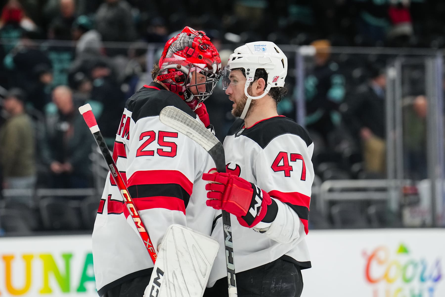 SEATTLE, WASHINGTON - JANUARY 06: Jacob Markstrom #25 of the New Jersey Devils is congratulated by Paul Cotter #47 after a game against the Seattle Kraken at Climate Pledge Arena on January 06, 2025 in Seattle, Washington. (Photo by Christopher Mast/NHLI via Getty Images)