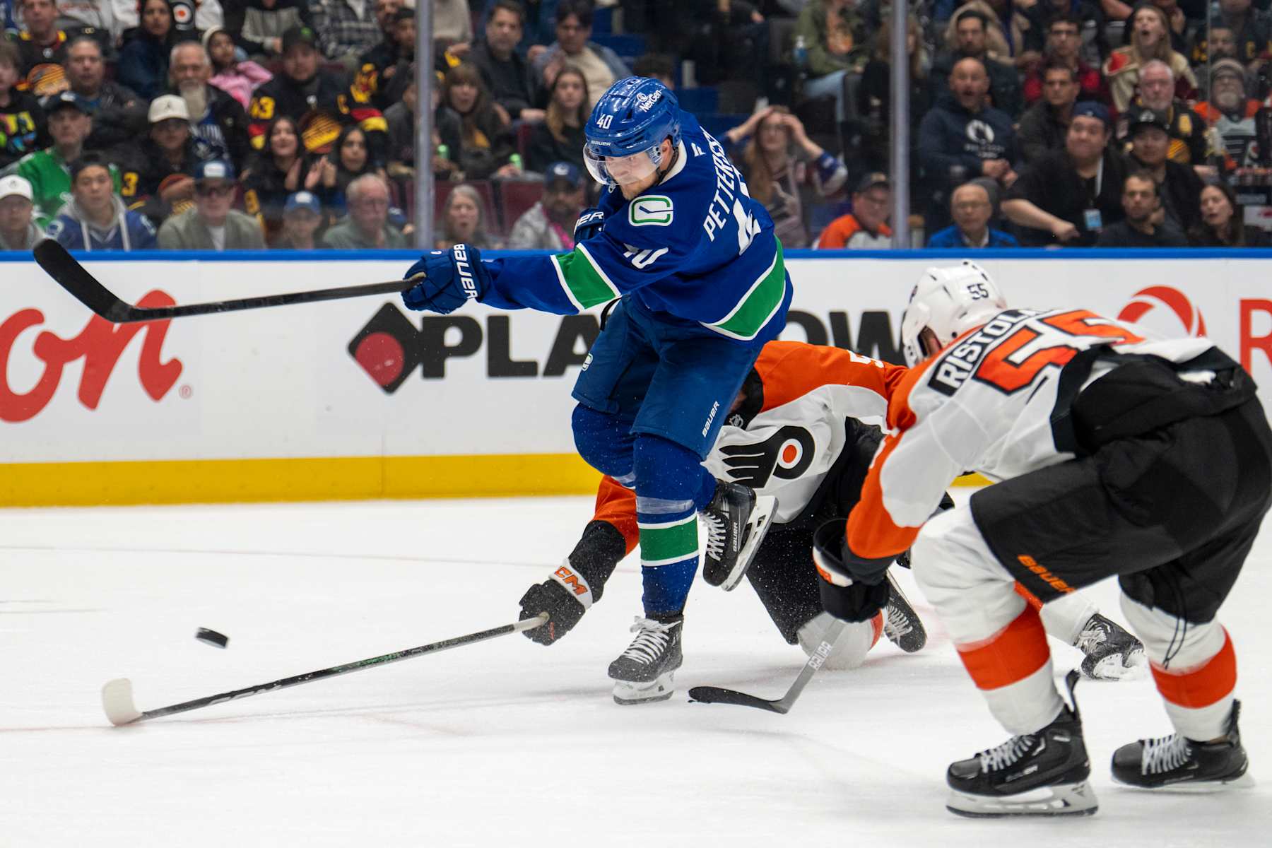 VANCOUVER, CANADA - OCTOBER 11:Elias Pettersson #40 of the Vancouver Canucks makes a shot during the third period of their NHL game against the Philadelphia Flyers at Rogers Arena on October 11, 2024 in Vancouver, British Columbia, Canada.  (Photo by Jeff Vinnick/NHLI via Getty Images)