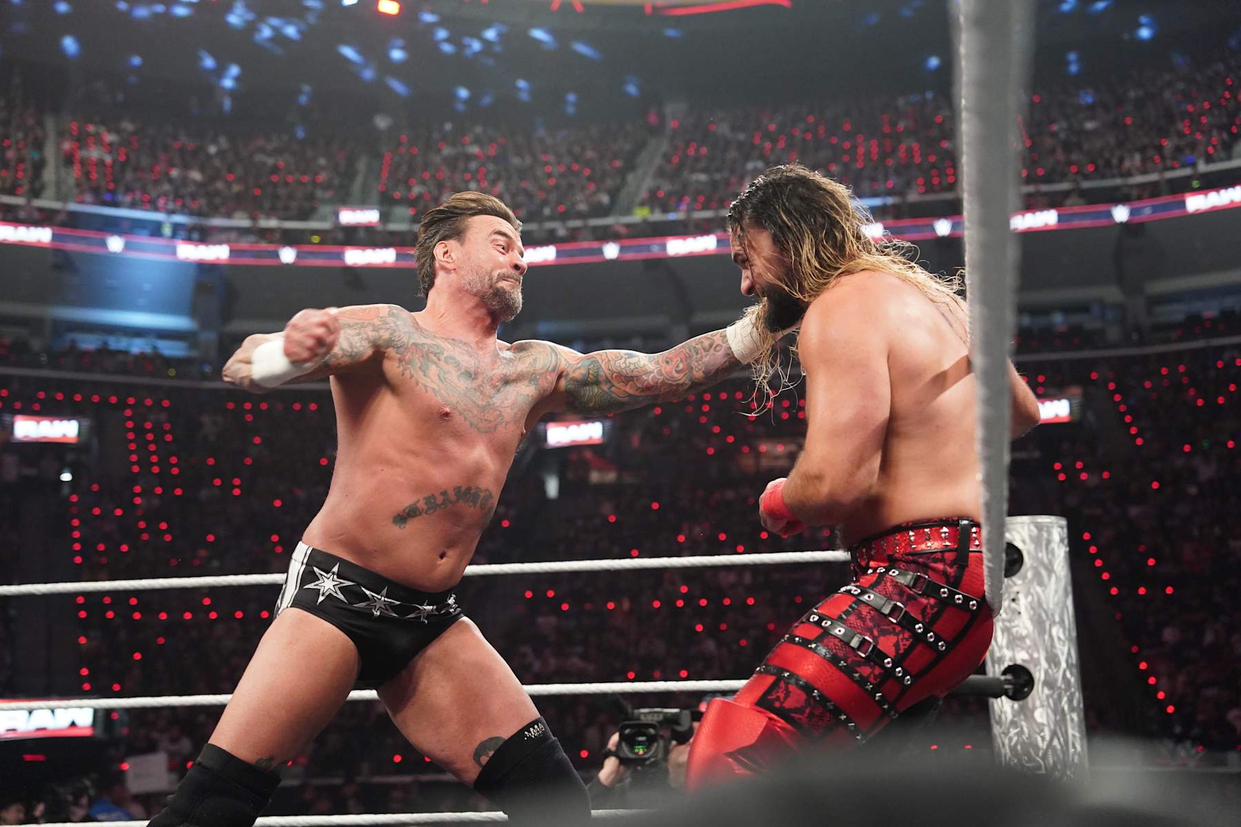 INGLEWOOD, CALIFORNIA - JANUARY 06: CM Punk and Seth Rollins in action during Monday Night RAW at Intuit Dome on January 6, 2025 in Inglewood, California. (Photo by WWE/Getty Images) INGLEWOOD, CALIFORNIA - JANUARY 06: CM Punk and Seth Rollins in action during Monday Night RAW at Intuit Dome on January 6, 2025 in Inglewood, California. (Photo by WWE/Getty Images)