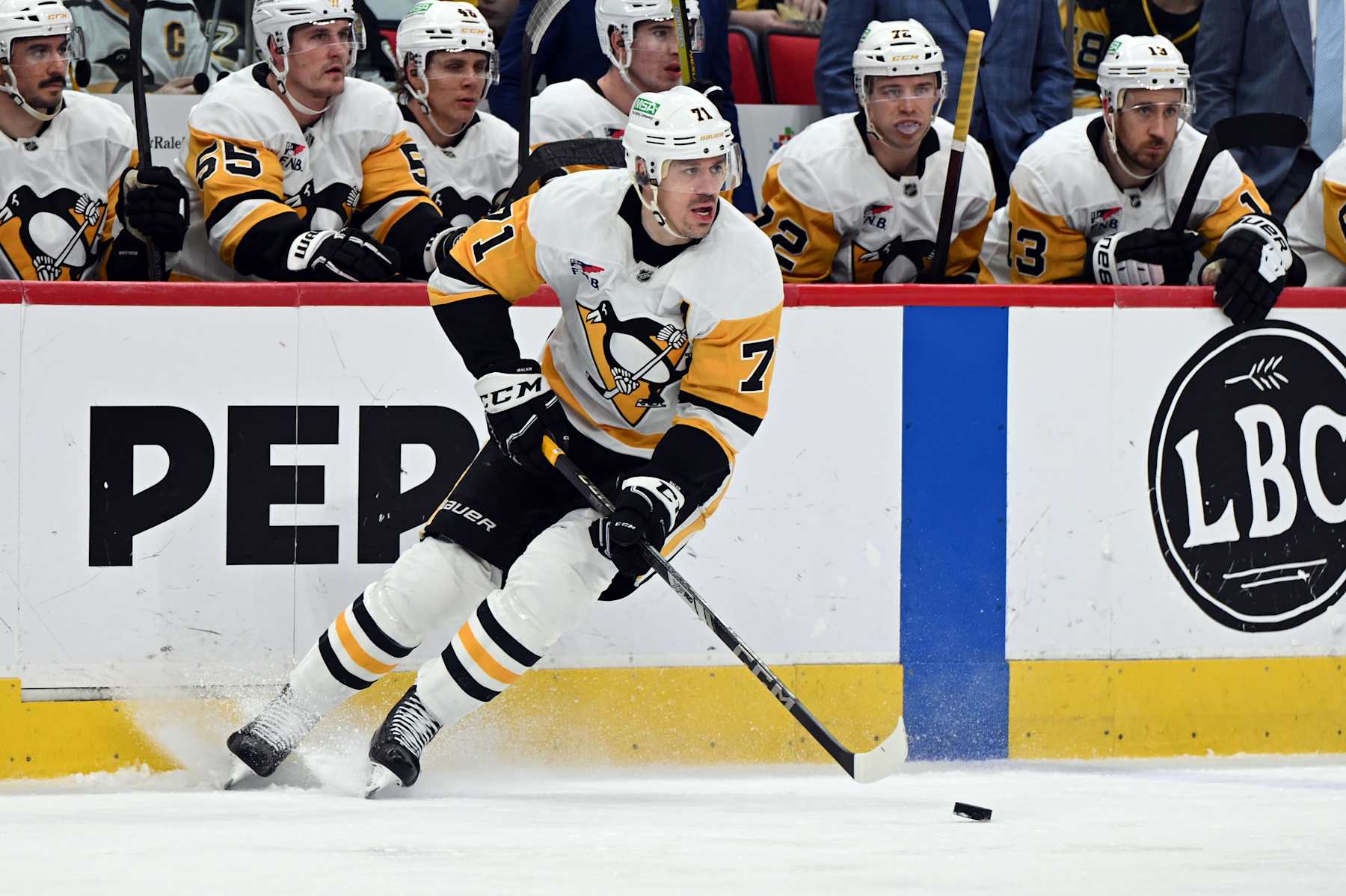 RALEIGH, NC - JANUARY 05: Pittsburgh Penguins center Evgeni Malkin (71) skates the puck into the zone during the NHL game between the Pittsburgh Penguins and the Carolina Hurricanes on January 5, 2025 at Lenovo Center in Raleigh, North Carolina. (Photo by Katherine Gawlik/Icon Sportswire via Getty Images)