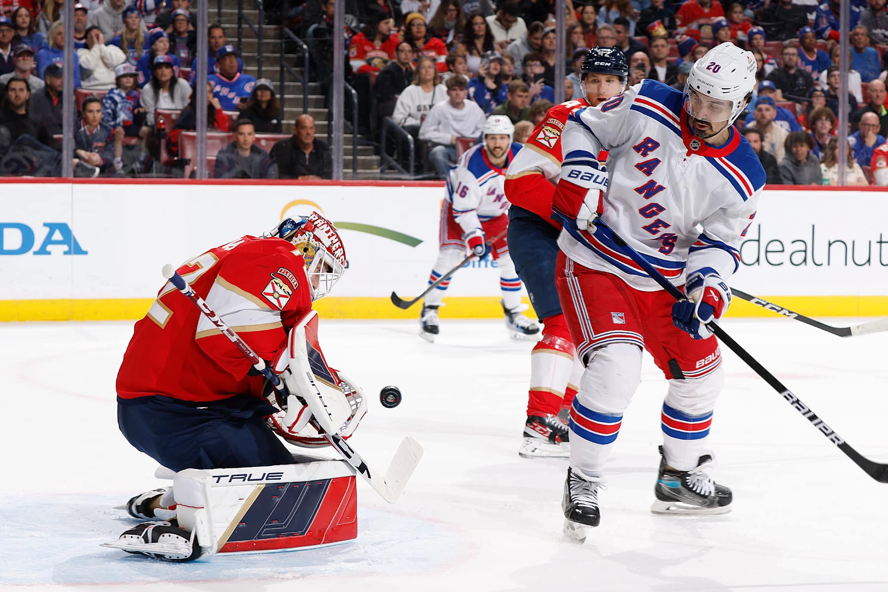 SUNRISE, FL - DECEMBER 30: Goaltender Sergei Bobrovsky #72 of the Florida Panthers stops a shot by Chris Kreider #20 of the New York Rangers during first period action at the Amerant Bank Arena on December 30, 2024 in Sunrise, Florida. (Photo by Joel Auerbach/Getty Images)