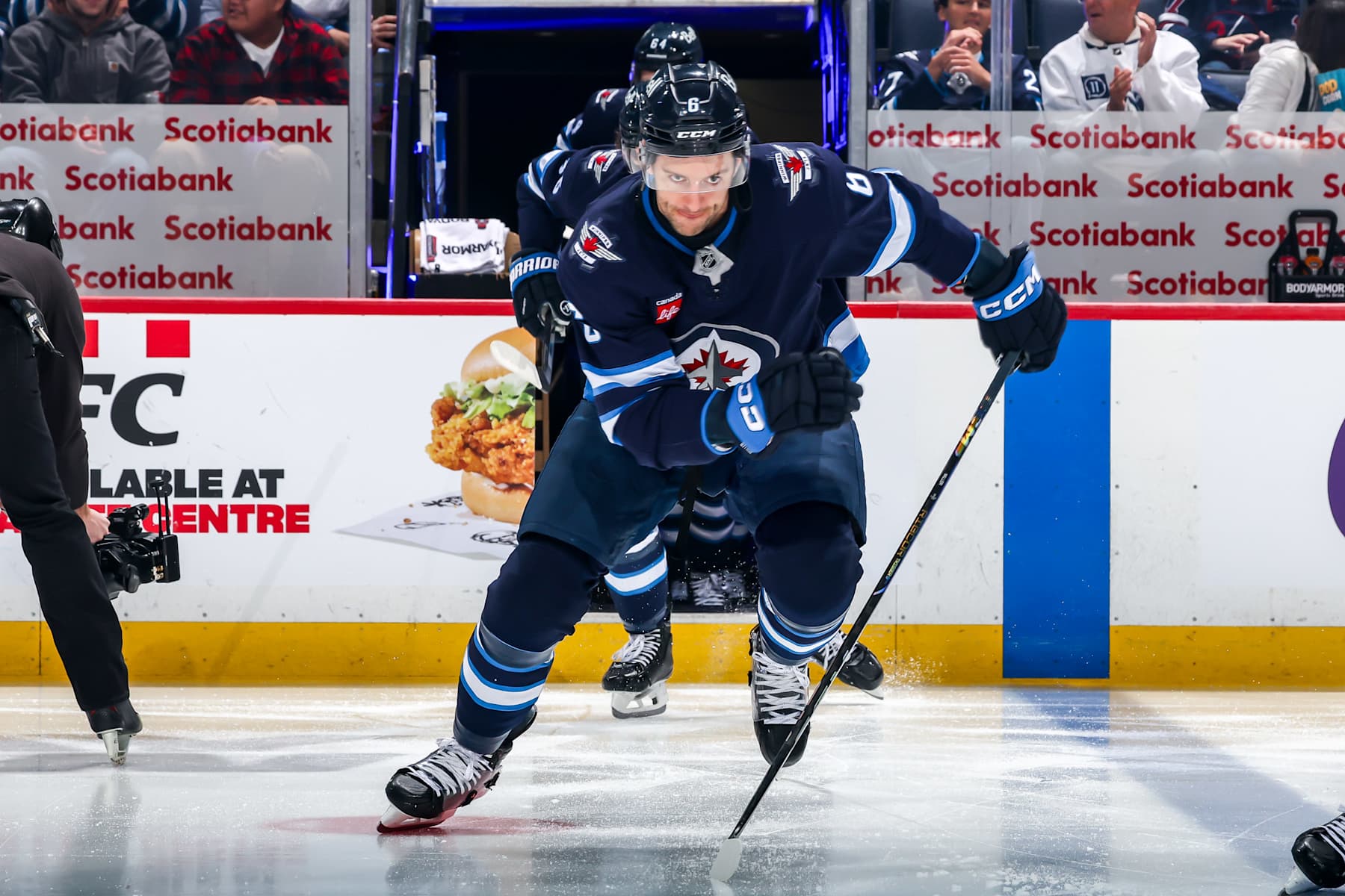 WINNIPEG, CANADA - JANUARY 4: Colin Miller #6 of the Winnipeg Jets hits the ice prior to puck drop against the Detroit Red Wings at the Canada Life Centre on January 4, 2025 in Winnipeg, Manitoba, Canada. (Photo by Jonathan Kozub/NHLI via Getty Images)