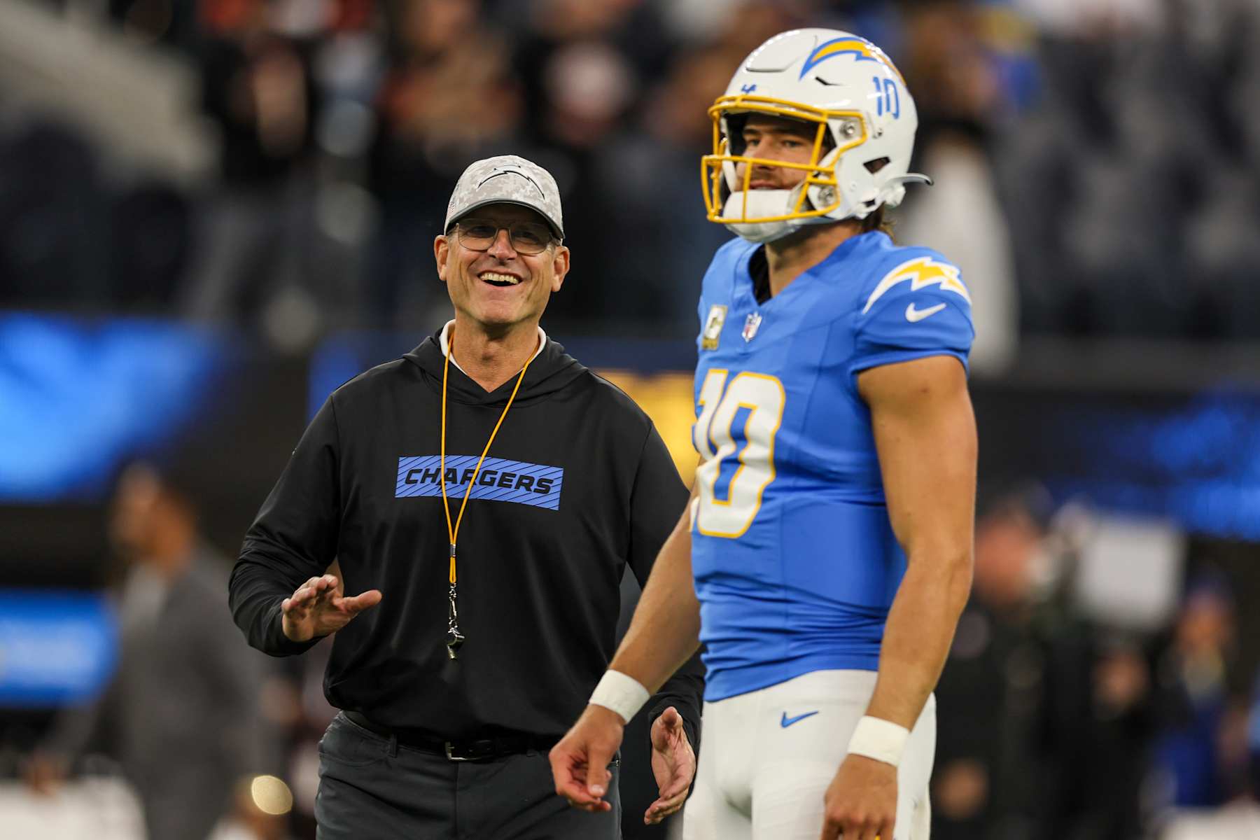 Inglewood, CA, Sunday, November 17, 2024 - Chargers head coach Jim Harbaugh with Justin Herbert during pregame warmups before a game against the Cincinnati Bengals at SoFi Stadium. (Robert Gauthier/Los Angeles Times via Getty Images)