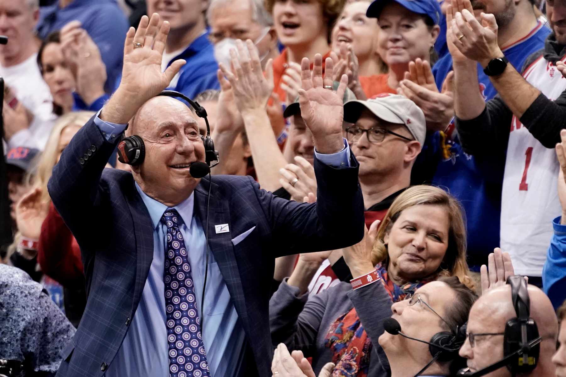 LAWRENCE, KANSAS - DECEMBER 17: Sportscaster Dick Vitale waves to the crowd as he is honored during a game between Indiana Hoosiers and Kansas Jayhawks in the first half at Allen Fieldhouse on December 17, 2022 in Lawrence, Kansas. (Photo by Ed Zurga/Getty Images)