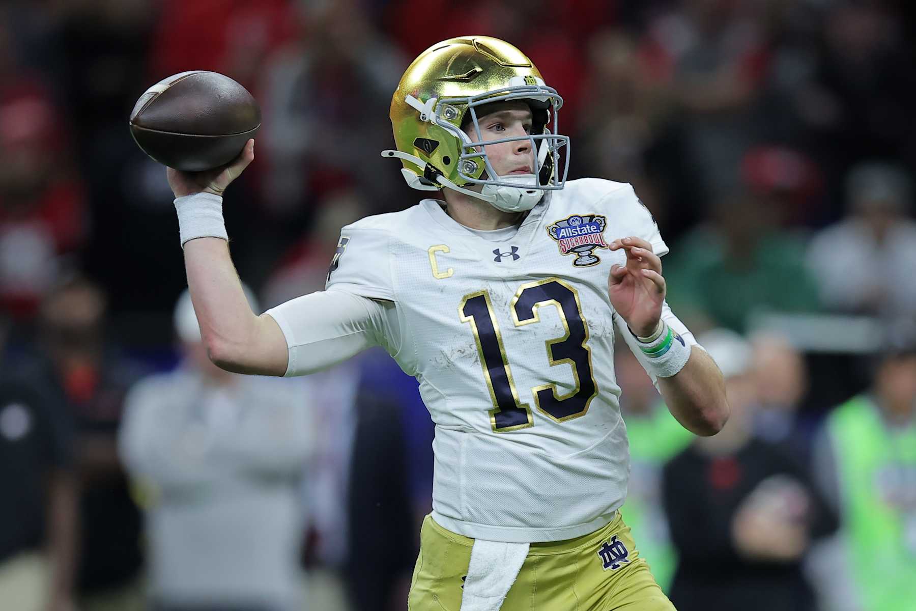 NEW ORLEANS, LOUISIANA - JANUARY 02: Riley Leonard #13 of the Notre Dame Fighting Irish throws the ball against the Georgia Bulldogs during the 91st Allstate Sugar Bowl at Caesars Superdome on January 02, 2025 in New Orleans, Louisiana. (Photo by Jonathan Bachman/Getty Images)