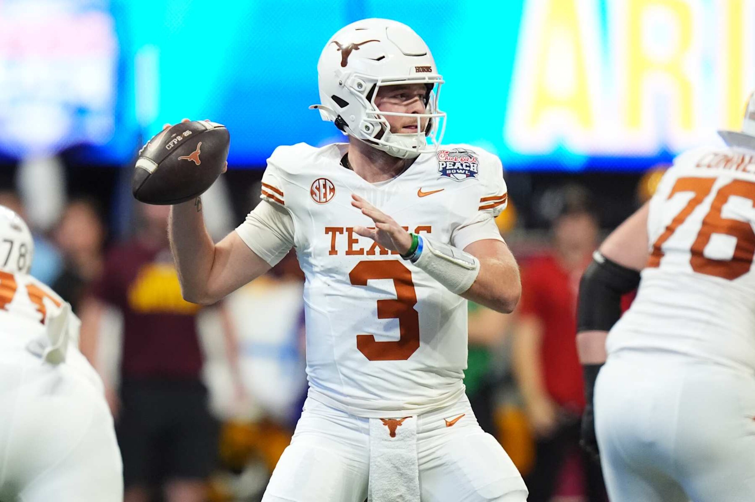 ATLANTA, GEORGIA - JANUARY 1: Quinn Ewers #3 of the Texas Longhorns attempts a pass against the Arizona State Sun Devils during the first half at Mercedes-Benz Stadium on January 1, 2025 in Atlanta, Georgia. (Photo by CFP/Getty Images) ATLANTA, GEORGIA - JANUARY 1: Quinn Ewers #3 of the Texas Longhorns attempts a pass against the Arizona State Sun Devils during the first half at Mercedes-Benz Stadium on January 1, 2025 in Atlanta, Georgia. (Photo by CFP/Getty Images)