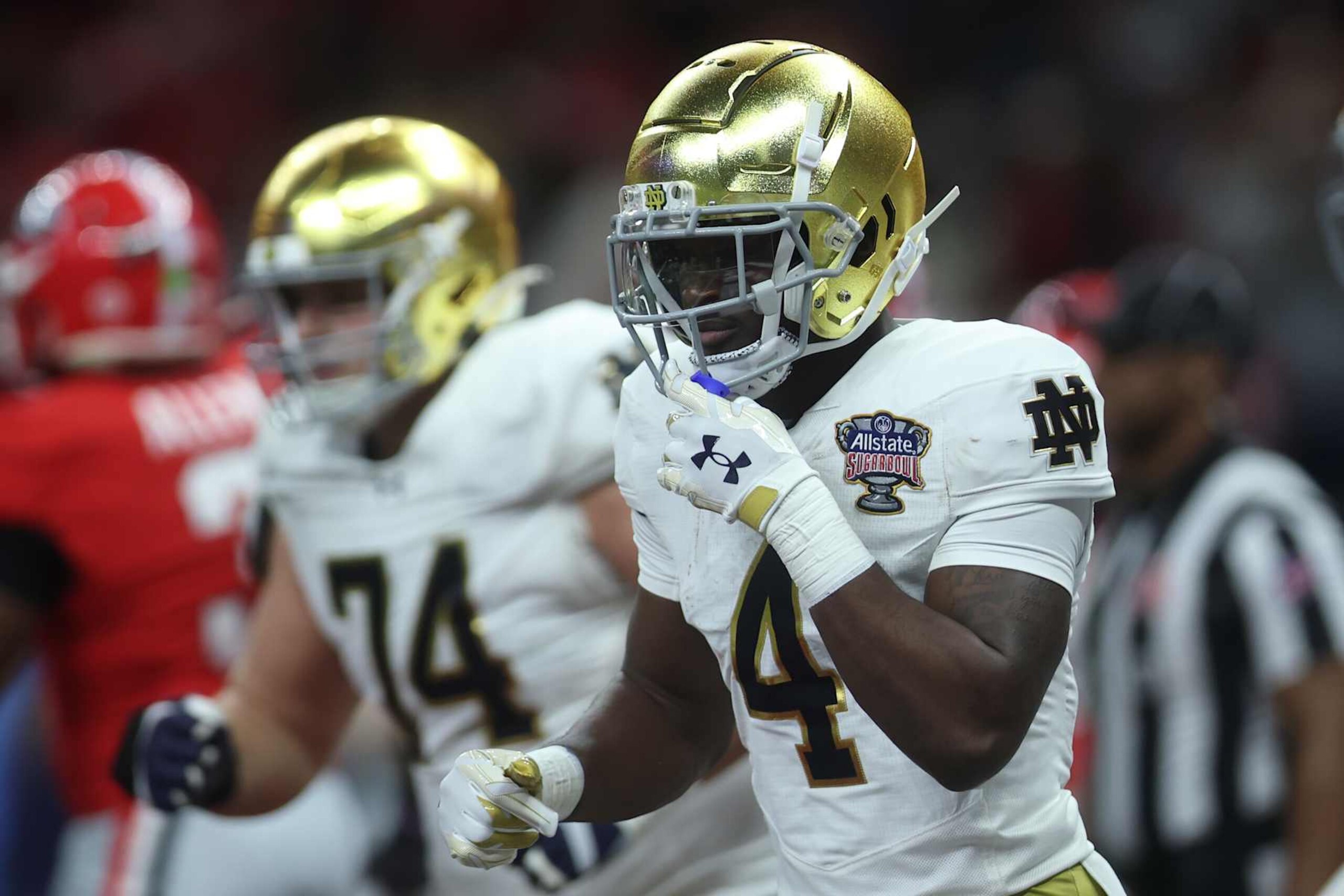NEW ORLEANS, LOUISIANA - JANUARY 02: Jeremiyah Love #4 of the Notre Dame Fighting Irish runs on the field during the second quarter against the Georgia Bulldogs during the 91st Allstate Sugar Bowl at Caesars Superdome on January 02, 2025 in New Orleans, Louisiana. (Photo by Chris Graythen/Getty Images) NEW ORLEANS, LOUISIANA - JANUARY 02: Jeremiyah Love #4 of the Notre Dame Fighting Irish runs on the field during the second quarter against the Georgia Bulldogs during the 91st Allstate Sugar Bowl at Caesars Superdome on January 02, 2025 in New Orleans, Louisiana. (Photo by Chris Graythen/Getty Images)