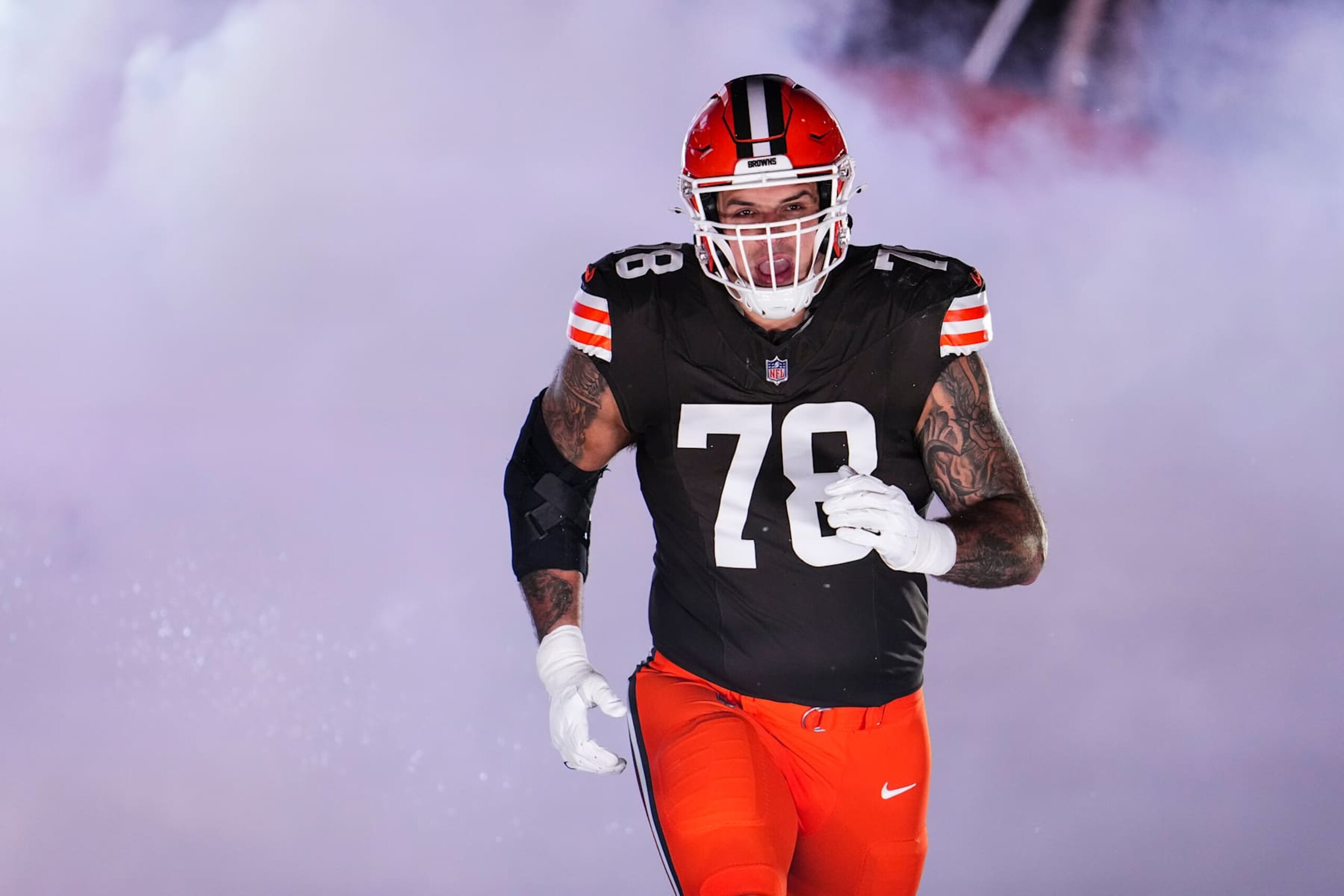 CLEVELAND, OH - NOVEMBER 21: Jack Conklin #78 of the Cleveland Browns runs out of the tunnel prior to an NFL football game against the Pittsburgh Steelers at Huntington Bank Field on November 21, 2024 in Cleveland, Ohio. (Photo by Cooper Neill/Getty Images)