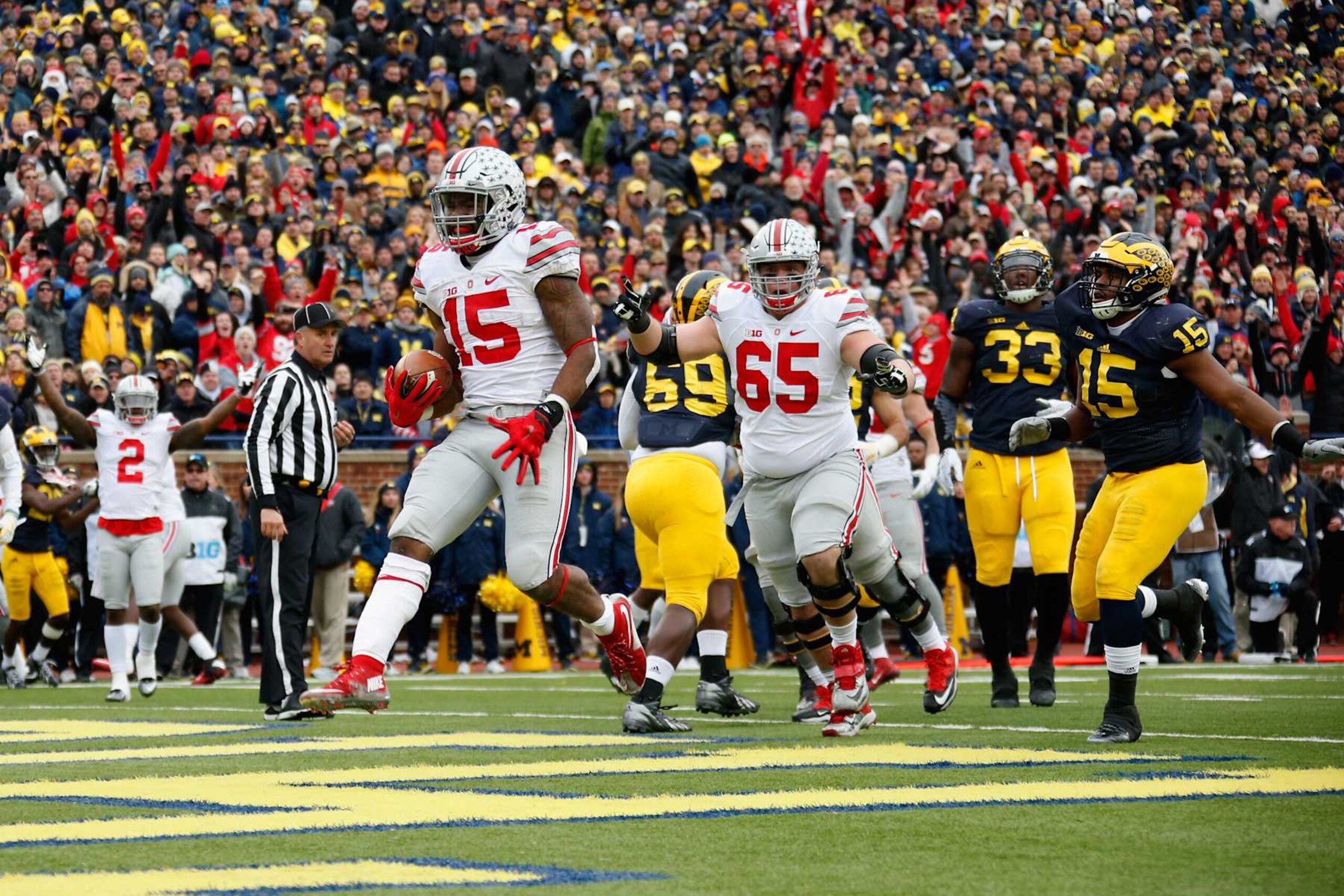 ANN ARBOR, MI - NOVEMBER 28: Running back Ezekiel Elliott #15 of the Ohio State Buckeyes celebrates after rushing for a second quarter touchdown against the Michigan Wolverines at Michigan Stadium on November 28, 2015 in Ann Arbor, Michigan. (Photo by Gregory Shamus/Getty Images) ANN ARBOR, MI - NOVEMBER 28: Running back Ezekiel Elliott #15 of the Ohio State Buckeyes celebrates after rushing for a second quarter touchdown against the Michigan Wolverines at Michigan Stadium on November 28, 2015 in Ann Arbor, Michigan. (Photo by Gregory Shamus/Getty Images)