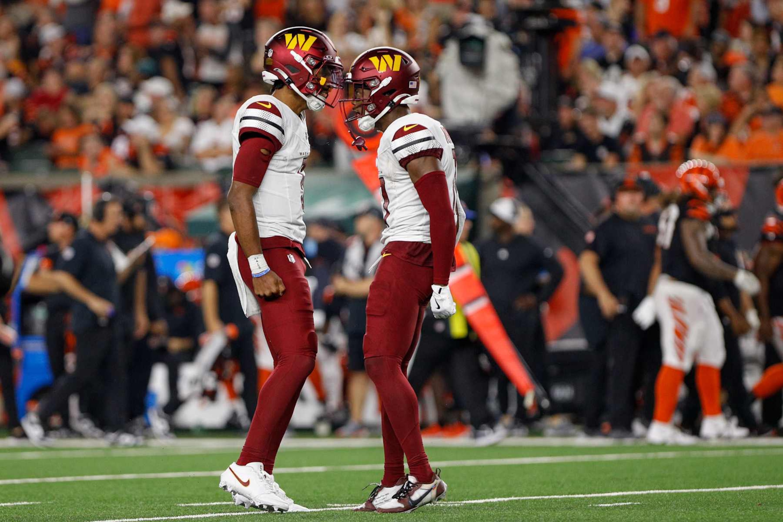 Commanders QB Jayden Daniels (left) and WR Terry McLaurin (right)