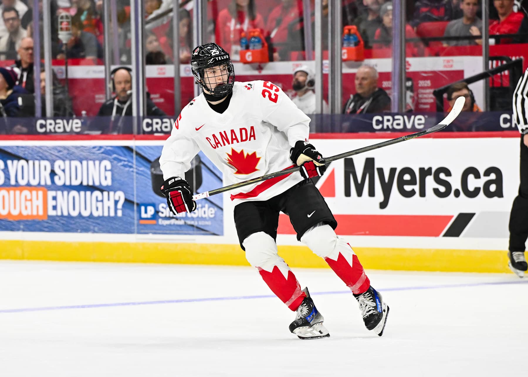 OTTAWA, CANADA - DECEMBER 26:  Matthew Schaefer #25 of Team Canada skates in the second period of the Group A match against Team Finland during the 2025 IIHF World Junior Championship at Canadian Tire Centre on December 26, 2024 in Ottawa, Ontario, Canada.  Team Canada defeated Team Finland 4-0.  (Photo by Minas Panagiotakis/Getty Images)