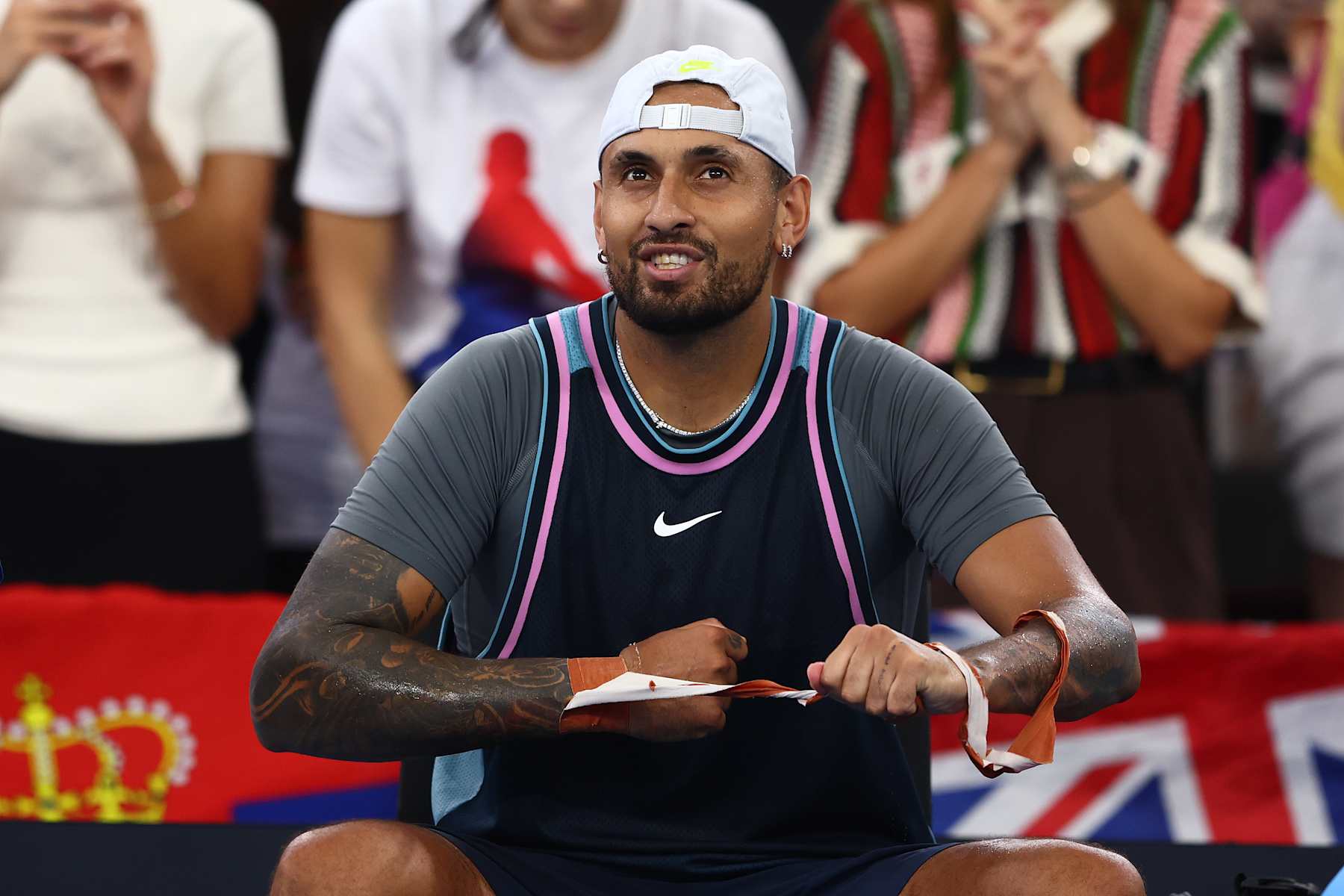 BRISBANE, AUSTRALIA - JANUARY 01:  Nick Kyrgios looks on in the Men's Doubles match partnered with Novak Djokovic against Michael Venus and Nikola Mektic during day four of the 2025 Brisbane International at Pat Rafter Arena on January 01, 2025 in Brisbane, Australia. (Photo by Chris Hyde/Getty Images)
