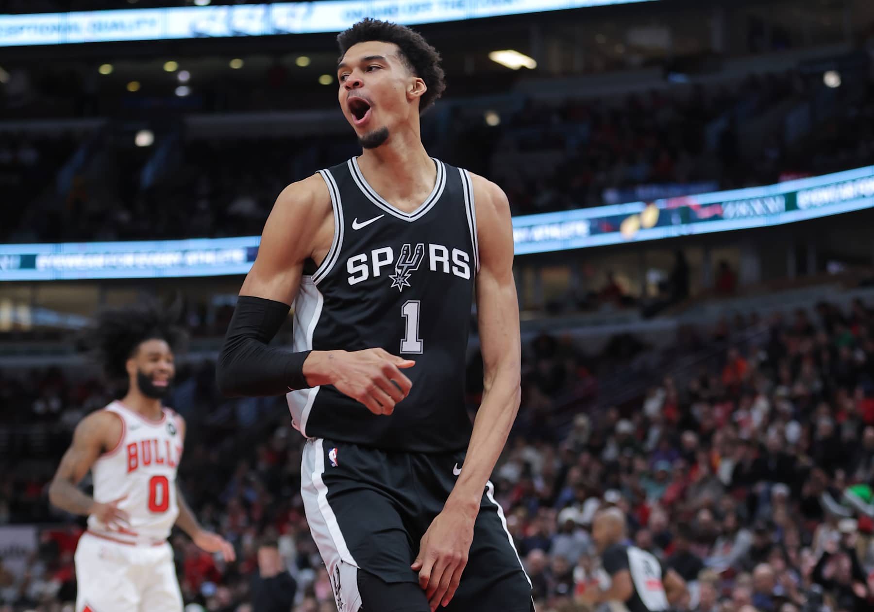 CHICAGO, IL - JANUARY 06: Victor Wembanyama #1 of the San Antonio Spurs reacts after a slam dunk during the first half against the Chicago Bulls on January 6, 2025 at the United Center in Chicago, Illinois. (Photo by Melissa Tamez/Icon Sportswire via Getty Images)