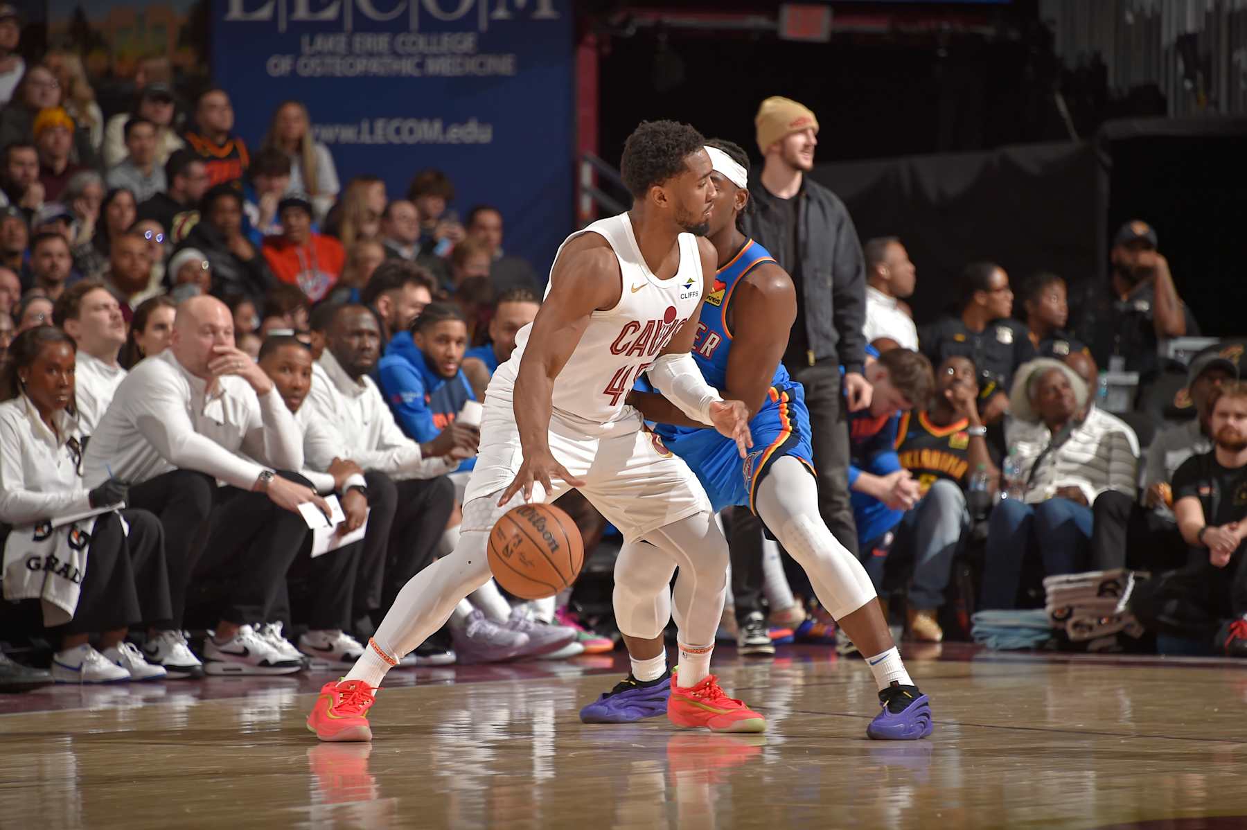 CLEVELAND, OH - JANUARY 8: Donovan Mitchell #45 of the Cleveland Cavaliers handles the ball during the game against the Oklahoma City Thunder on January 8, 2025 at Rocket Mortgage FieldHouse in Cleveland, Ohio. NOTE TO USER: User expressly acknowledges and agrees that, by downloading and/or using this Photograph, user is consenting to the terms and conditions of the Getty Images License Agreement. Mandatory Copyright Notice: Copyright 2025 NBAE (Photo by David Liam Kyle/NBAE via Getty Images)