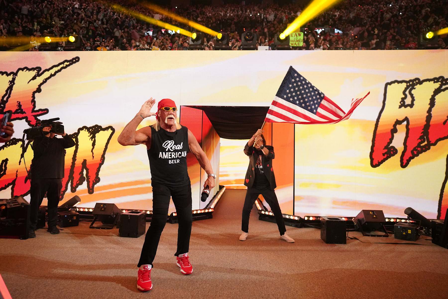 INGLEWOOD, CALIFORNIA - JANUARY 06: Hulk Hogan with Jimmy Hart along side address the crowd during RAW at Intuit Dome on January 6, 2025 in Inglewood, California.  (Photo by WWE/Getty Images)