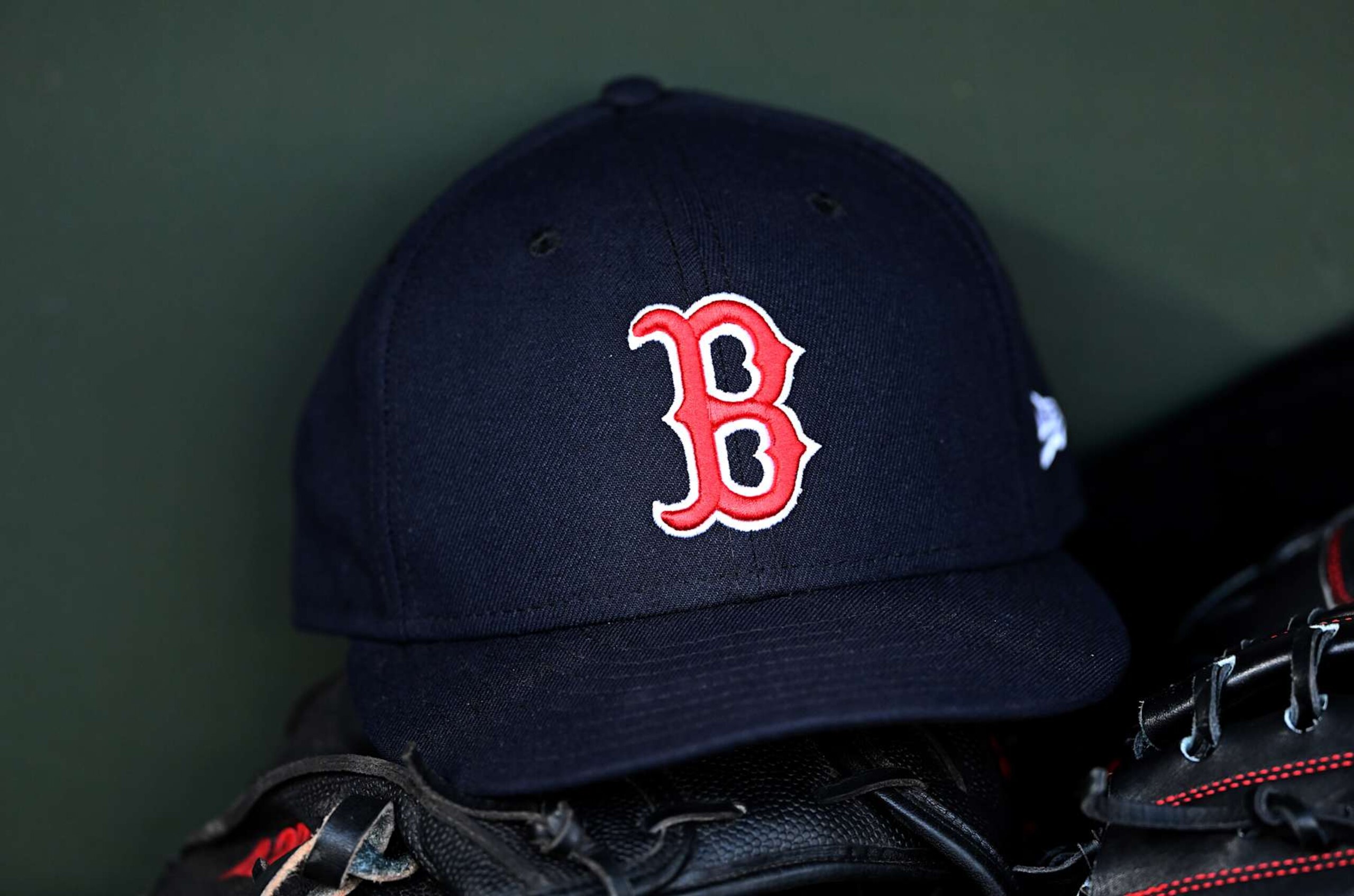 BALTIMORE, MARYLAND - AUGUST 15: A view of a Boston Red Sox baseball cap in the dugout before the game against the Baltimore Orioles at Oriole Park at Camden Yards on August 15, 2024 in Baltimore, Maryland. (Photo by G Fiume/Getty Images) BALTIMORE, MARYLAND - AUGUST 15: A view of a Boston Red Sox baseball cap in the dugout before the game against the Baltimore Orioles at Oriole Park at Camden Yards on August 15, 2024 in Baltimore, Maryland. (Photo by G Fiume/Getty Images)