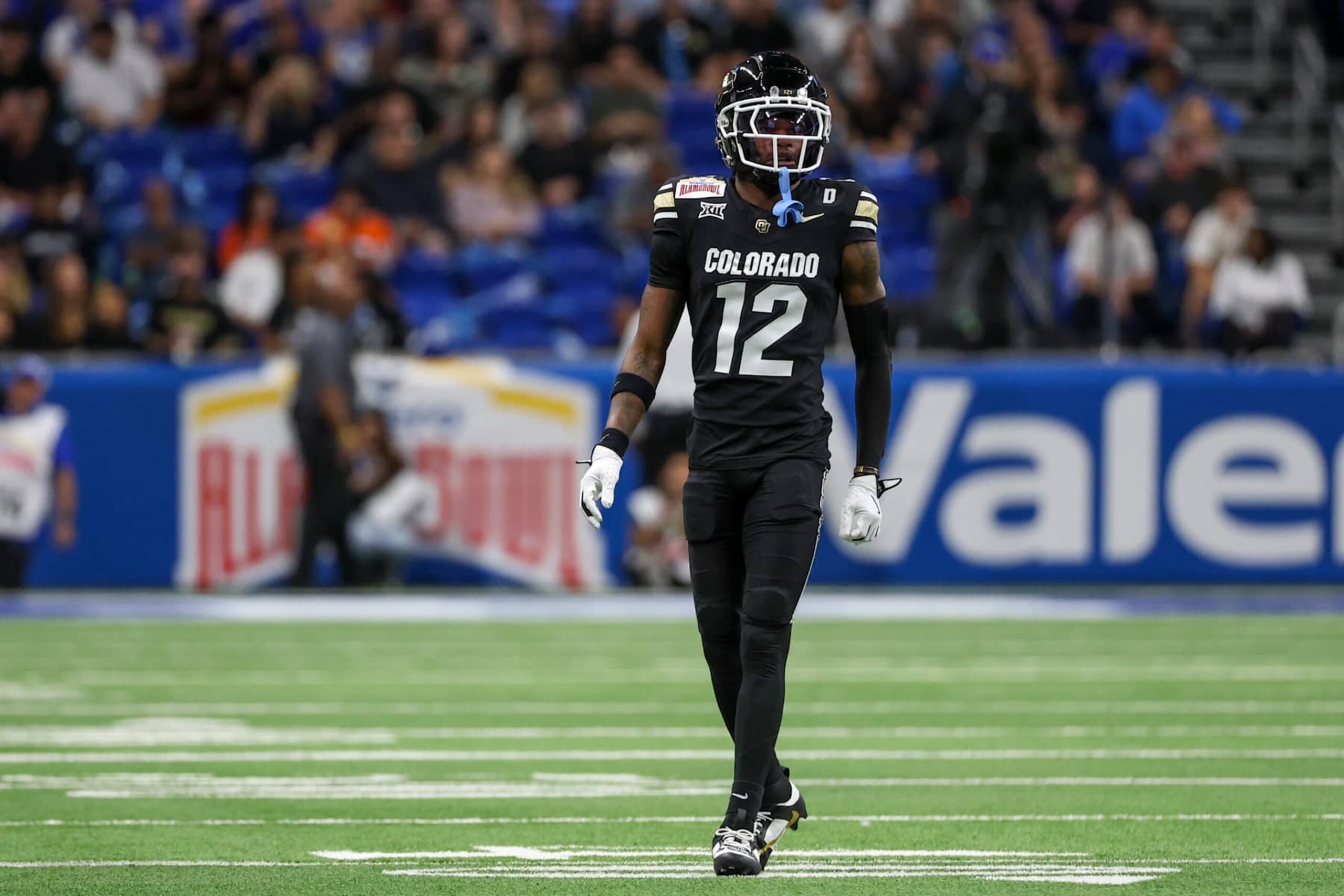 SAN ANTONIO, TX - DECEMBER 28: Colorado Buffaloes wide receiver Travis Hunter (12) readies for play during the football game between BYU Cougars and Colorado Buffalos on December 28, 2024, at the Alamodome in San Antonio, Texas. (Photo by David Buono/Icon Sportswire via Getty Images)