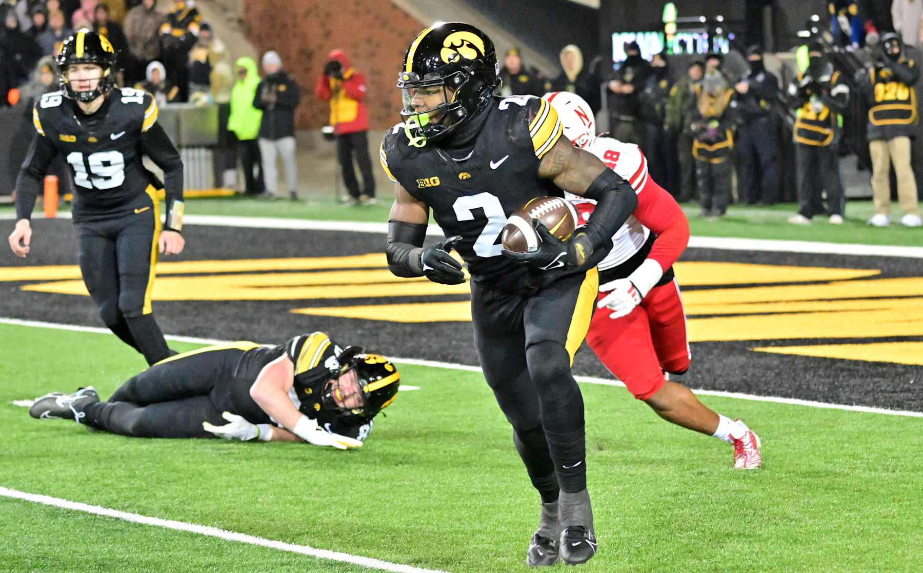 IOWA CITY, IA - NOVEMBER 29: Iowa running back Kaleb Johnson (2) runs the ball in the second half during a  college football game between the Nebraska Cornhuskers and the Iowa Hawkeyes, on November 29, 2024, at Kinnick Stadium, Iowa City, IA. (Photo by Keith Gillett/IconSportswire)
