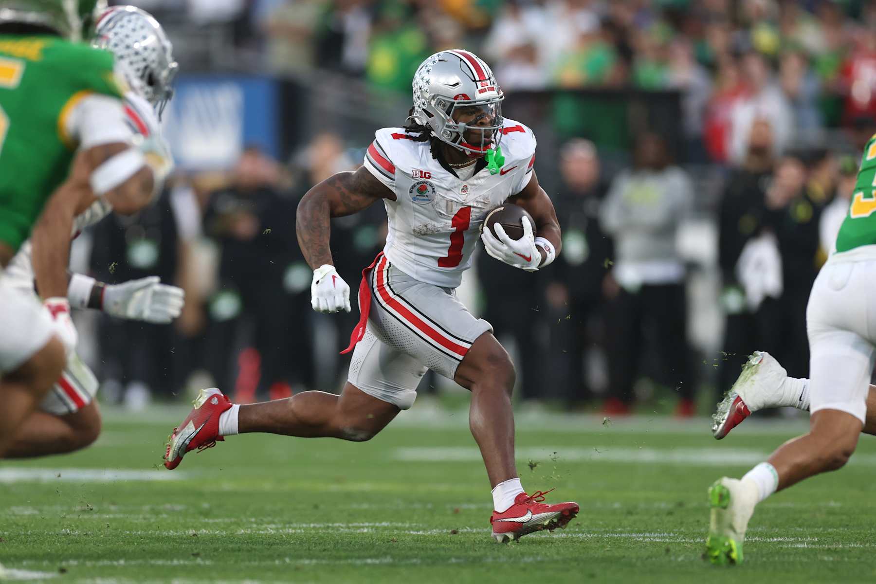 PASADENA, CALIFORNIA - JANUARY 01: Quinshon Judkins #1 of the Ohio State Buckeyes runs the ball during the third quarter against the Oregon Ducks during the Rose Bowl Game Presented by Prudential at Rose Bowl Stadium on January 01, 2025 in Pasadena, California. (Photo by Sean M. Haffey/Getty Images)