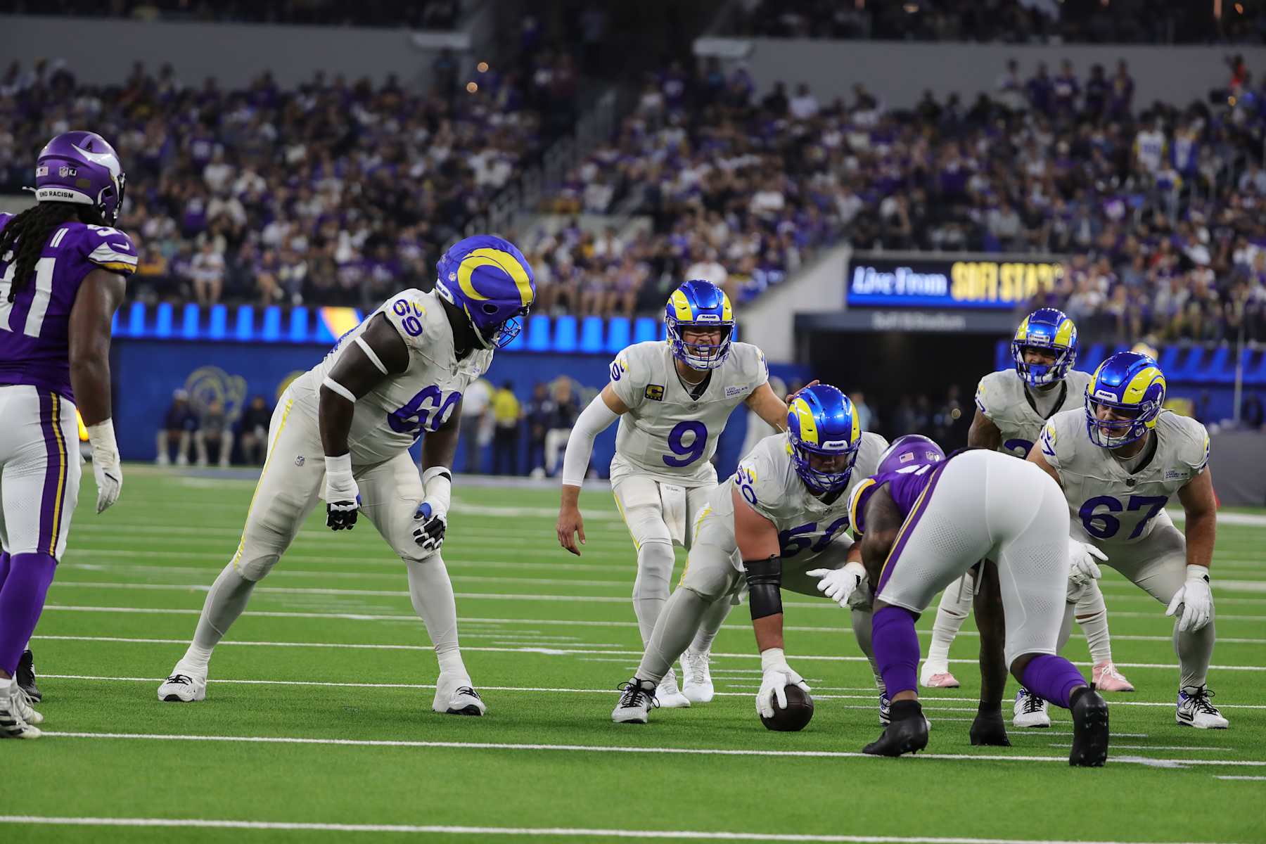 INGLEWOOD, CA - OCTOBER 24: Los Angeles Rams quarterback Matthew Stafford (9) and Los Angeles Rams guard Kevin Dotson (69) set to snap the football during the Minnesota Vikings vs Los Angeles Rams on October 24, 2024, at SoFi Stadium in Inglewood, CA. (Photo by Jevone Moore/Icon Sportswire via Getty Images)