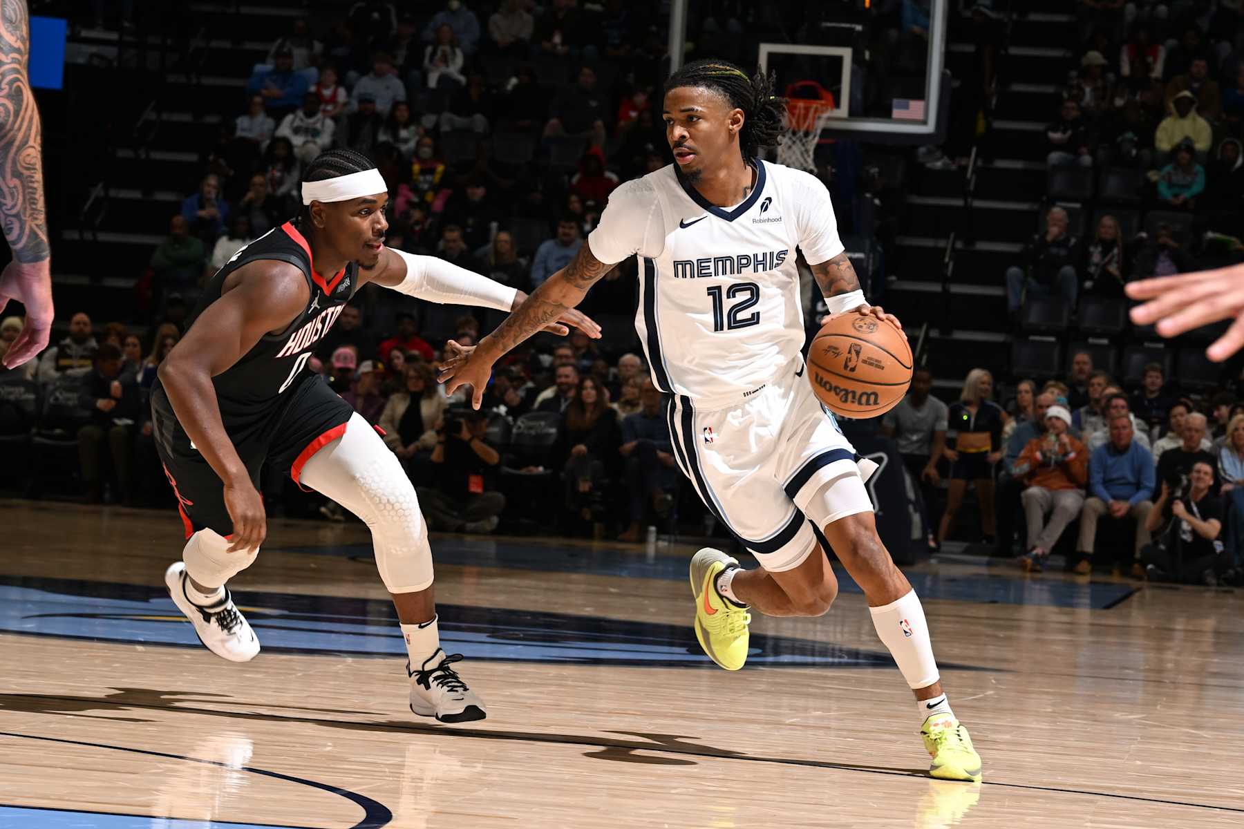 MEMPHIS, TN - JANUARY 9:  Ja Morant #12 of the Memphis Grizzlies dribbles the ball during the game against the Houston Rockets on January  9, 2025 at FedExForum in Memphis, Tennessee. NOTE TO USER: User expressly acknowledges and agrees that, by downloading and or using this photograph, User is consenting to the terms and conditions of the Getty Images License Agreement. Mandatory Copyright Notice: Copyright 2025 NBAE (Photo by Grant Burke/NBAE via Getty Images)