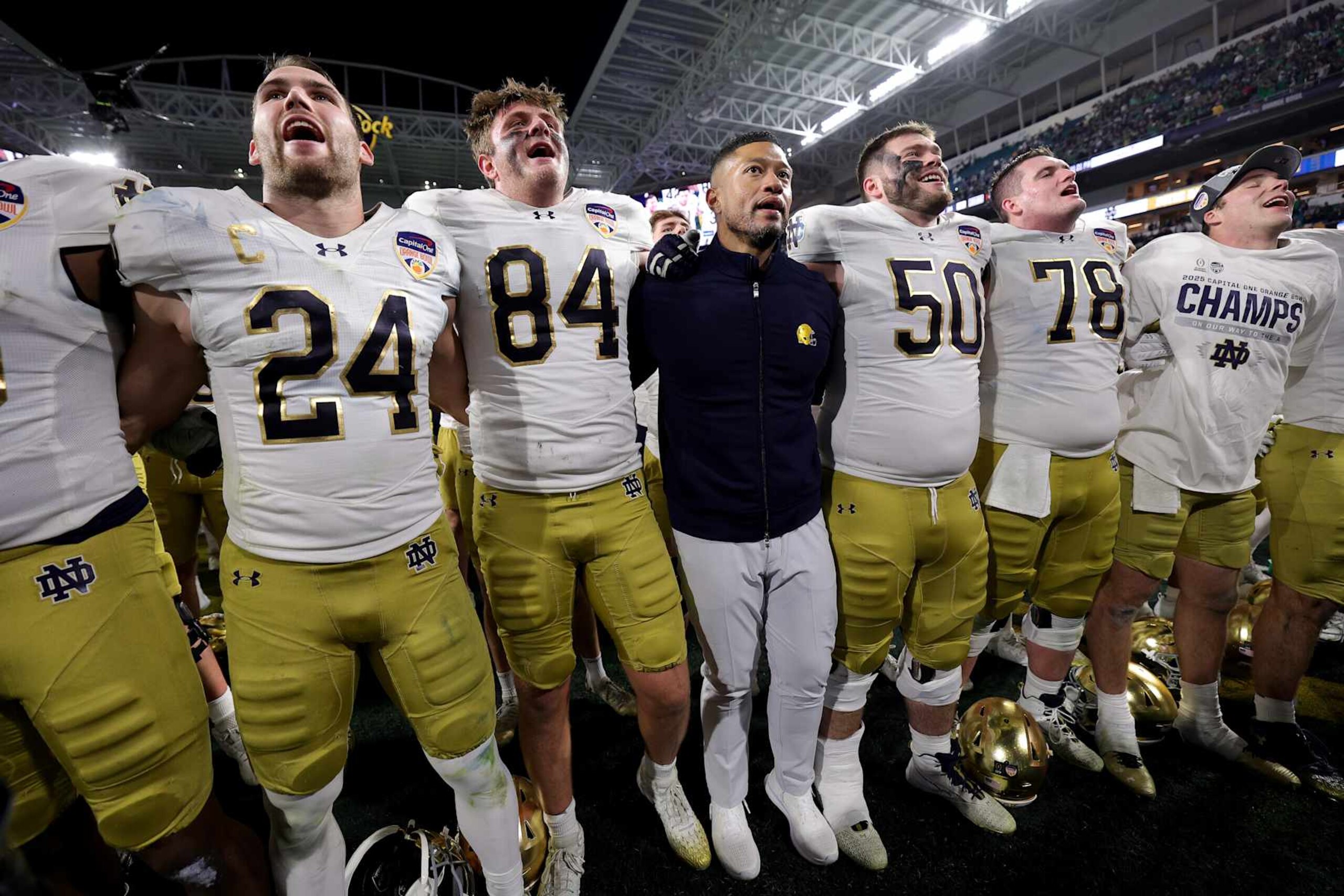 MIAMI GARDENS, FLORIDA - JANUARY 09: Head coach Marcus Freeman of the Notre Dame Fighting Irish celebrates with his team after defeating the Penn State Nittany Lions 27-2 in the Capital One Orange Bowl at Hard Rock Stadium on January 09, 2025 in Miami Gardens, Florida. (Photo by Carmen Mandato/Getty Images)