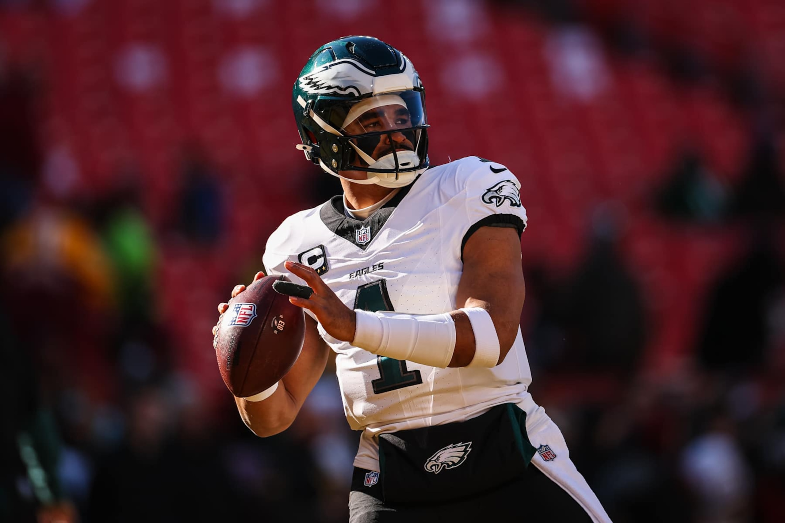 LANDOVER, MD - DECEMBER 22: Jalen Hurts #1 of the Philadelphia Eagles attempts a pass before the game against the Washington Commanders at Northwest Stadium on December 22, 2024 in Landover, Maryland. (Photo by Scott Taetsch/Getty Images) LANDOVER, MD - DECEMBER 22: Jalen Hurts #1 of the Philadelphia Eagles attempts a pass before the game against the Washington Commanders at Northwest Stadium on December 22, 2024 in Landover, Maryland. (Photo by Scott Taetsch/Getty Images)