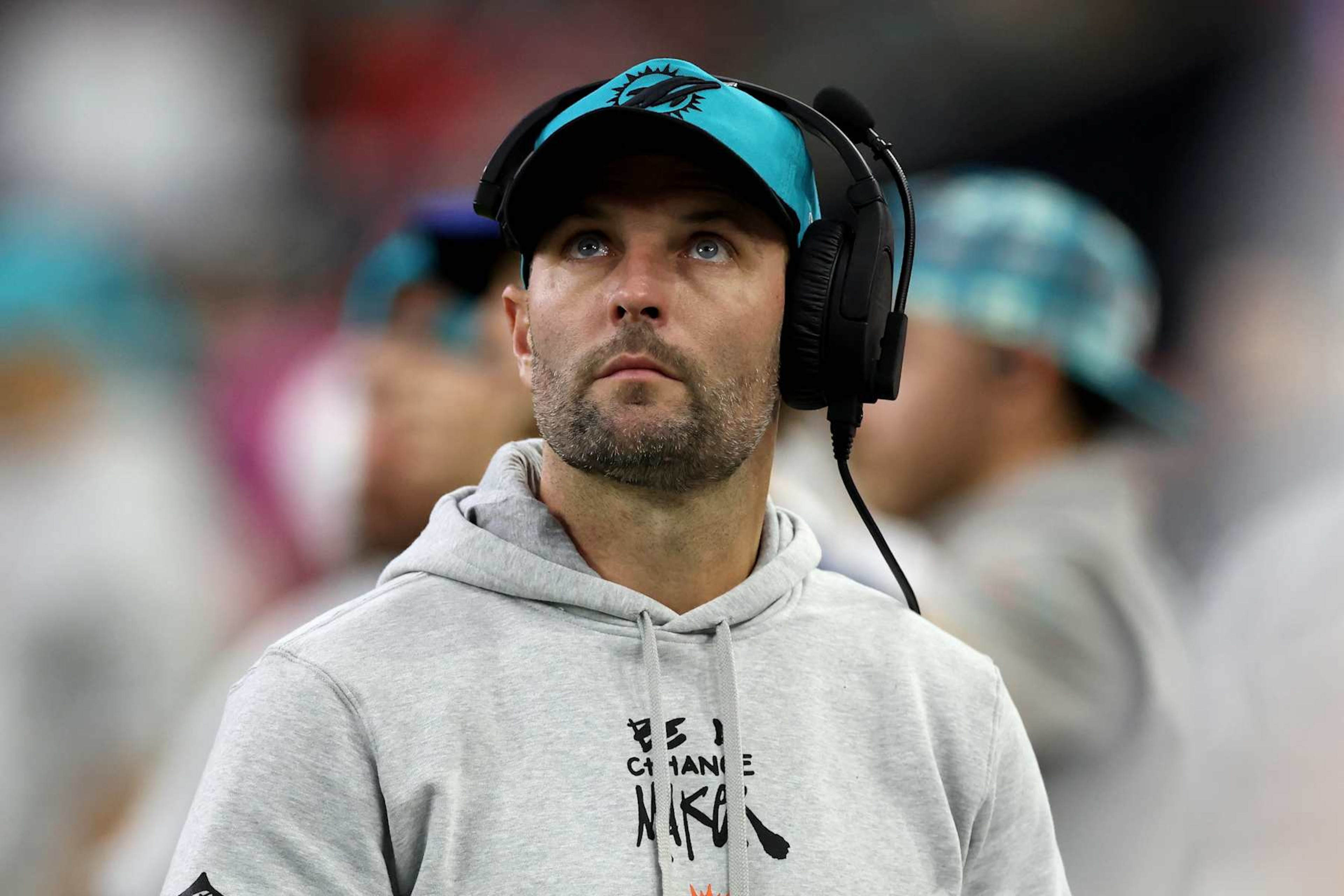 HOUSTON, TEXAS - DECEMBER 15: Wide receivers and passing game specialist Wes Welker of the Miami Dolphins watches on the sideline in the second half against the Houston Texans at NRG Stadium on December 15, 2024 in Houston, Texas. (Photo by Tim Warner/Getty Images) HOUSTON, TEXAS - DECEMBER 15: Wide receivers and passing game specialist Wes Welker of the Miami Dolphins watches on the sideline in the second half against the Houston Texans at NRG Stadium on December 15, 2024 in Houston, Texas. (Photo by Tim Warner/Getty Images)