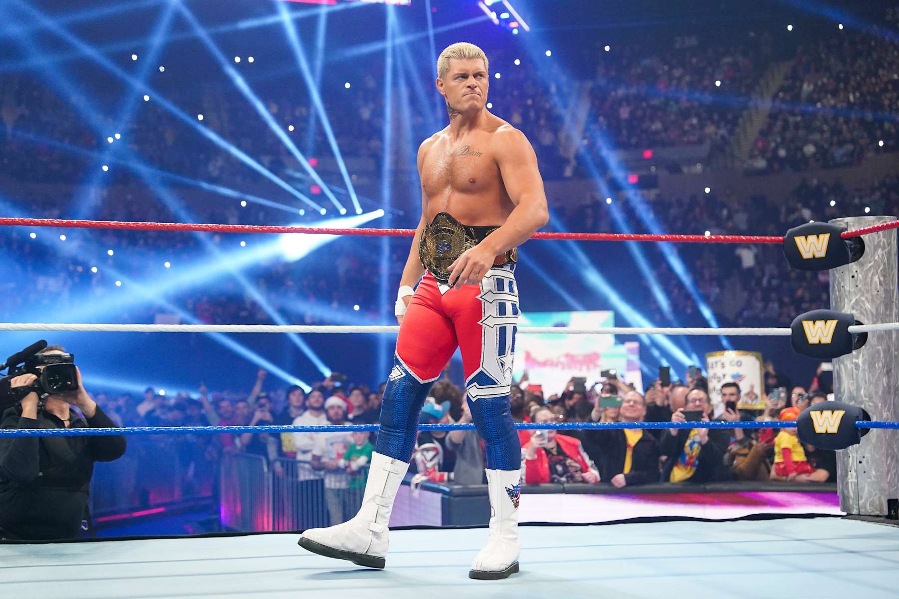 UNIONDALE, NEW YORK - DECEMBER 14: Cody Rhodes enters the ring during Saturday Night Main Event at Nassau Veterans Memorial Coliseum on December 14, 2024 in Uniondale, New York.  (Photo by WWE/Getty Images)